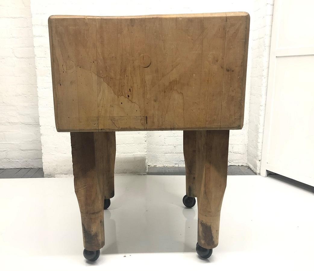 1950s French Butcher block table. The butcher block is in vintage condition having original casters and is solid wood.
