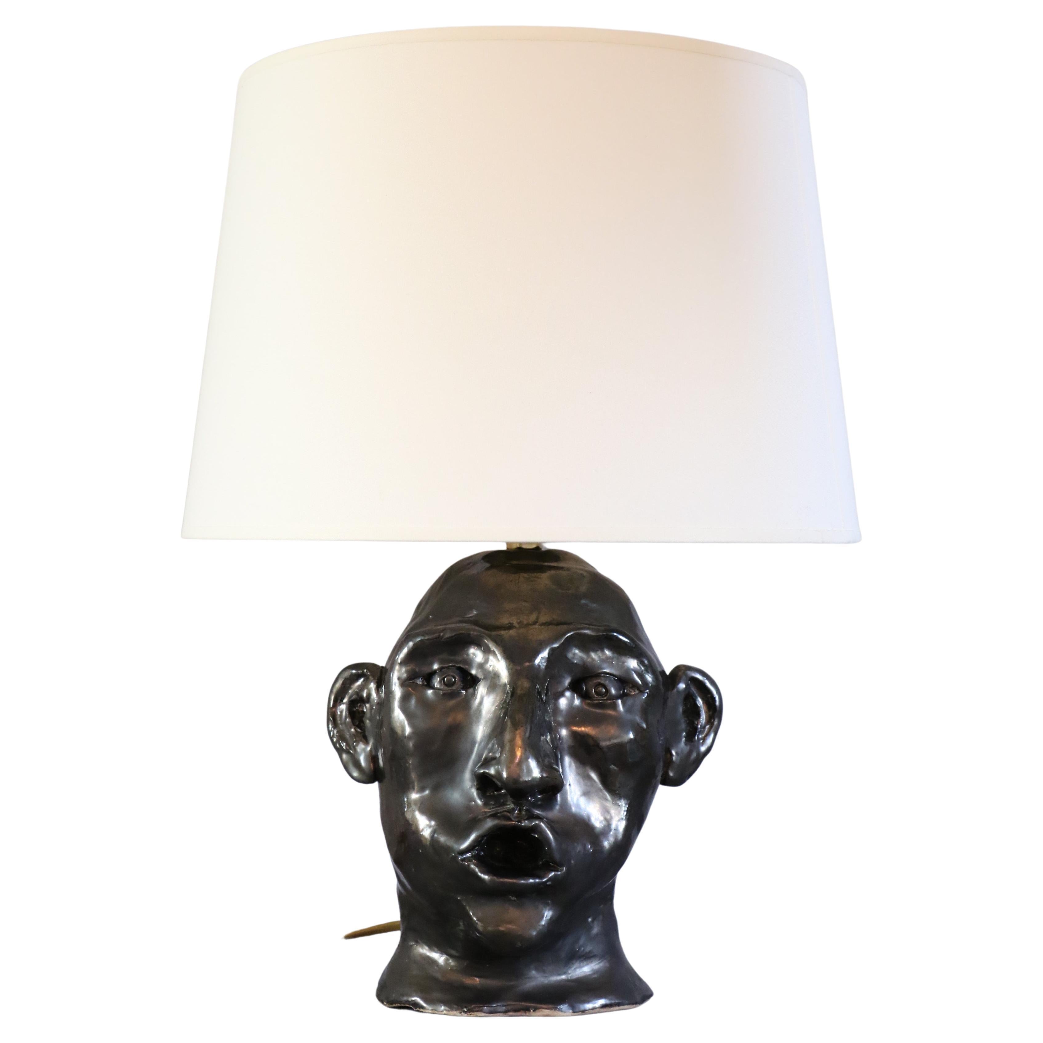 1950s French ceramic lamp with face decoration in the style of Georges Jouve