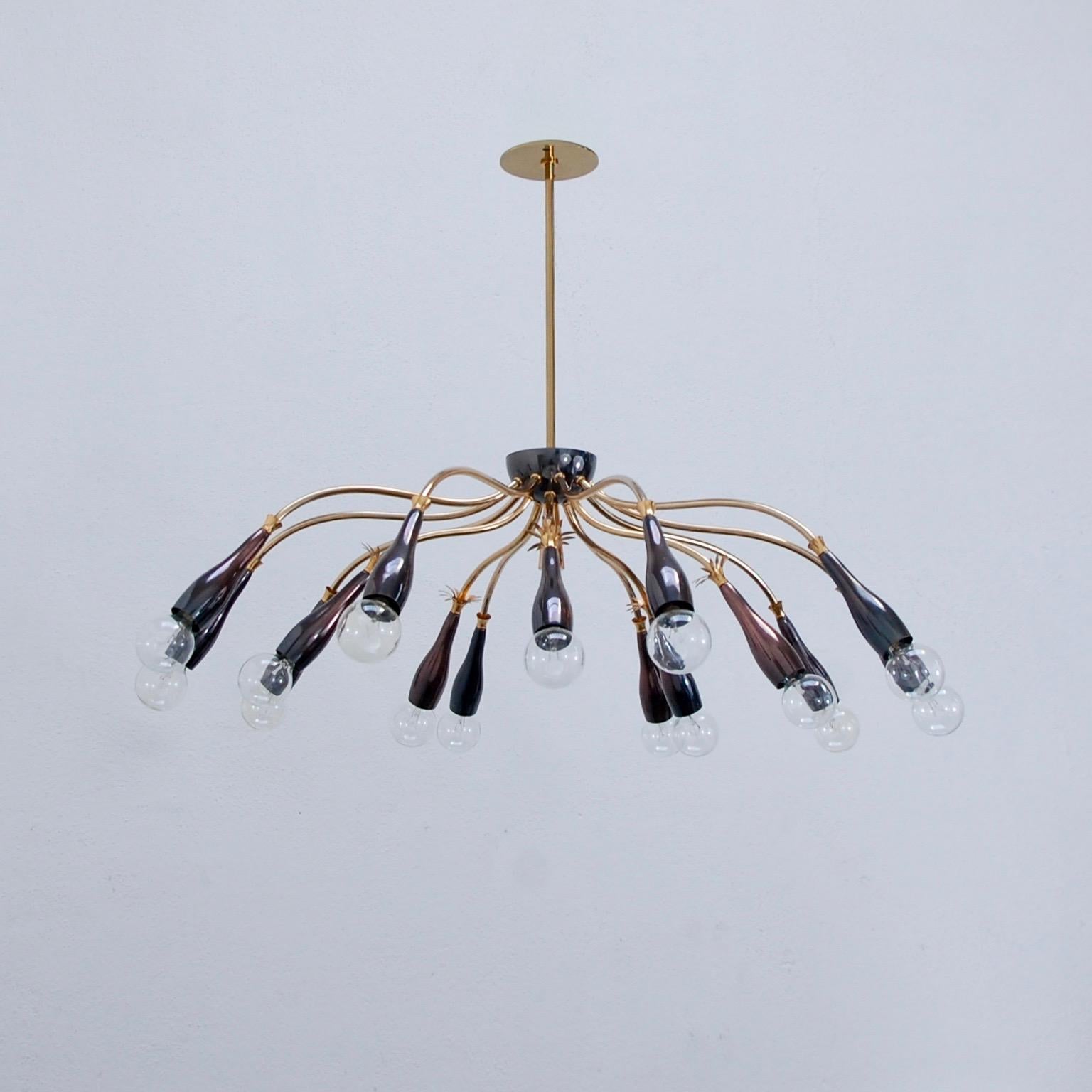 Immaculate 15 light midcentury French chandelier. True to the period with botanical details. Completely rewired for use in the US. E12 light bulbs (1 per socket). Light bulbs included with order.
Measures: Drop 22.5”
Fixture height 10.5”
Diameter