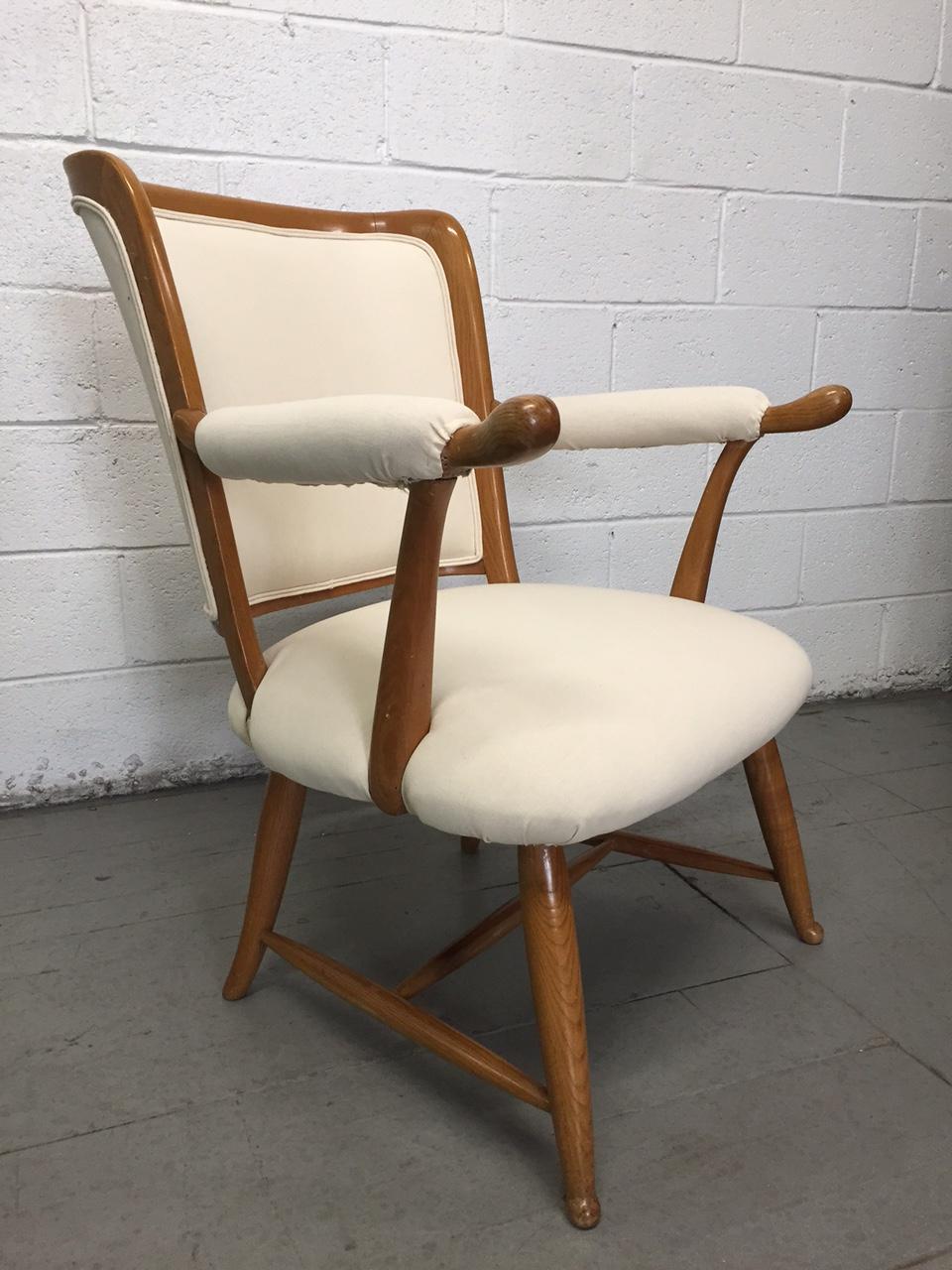 Pair of 1950s French country armchairs. Has an oak frame with a linen-blend upholstered fabric.