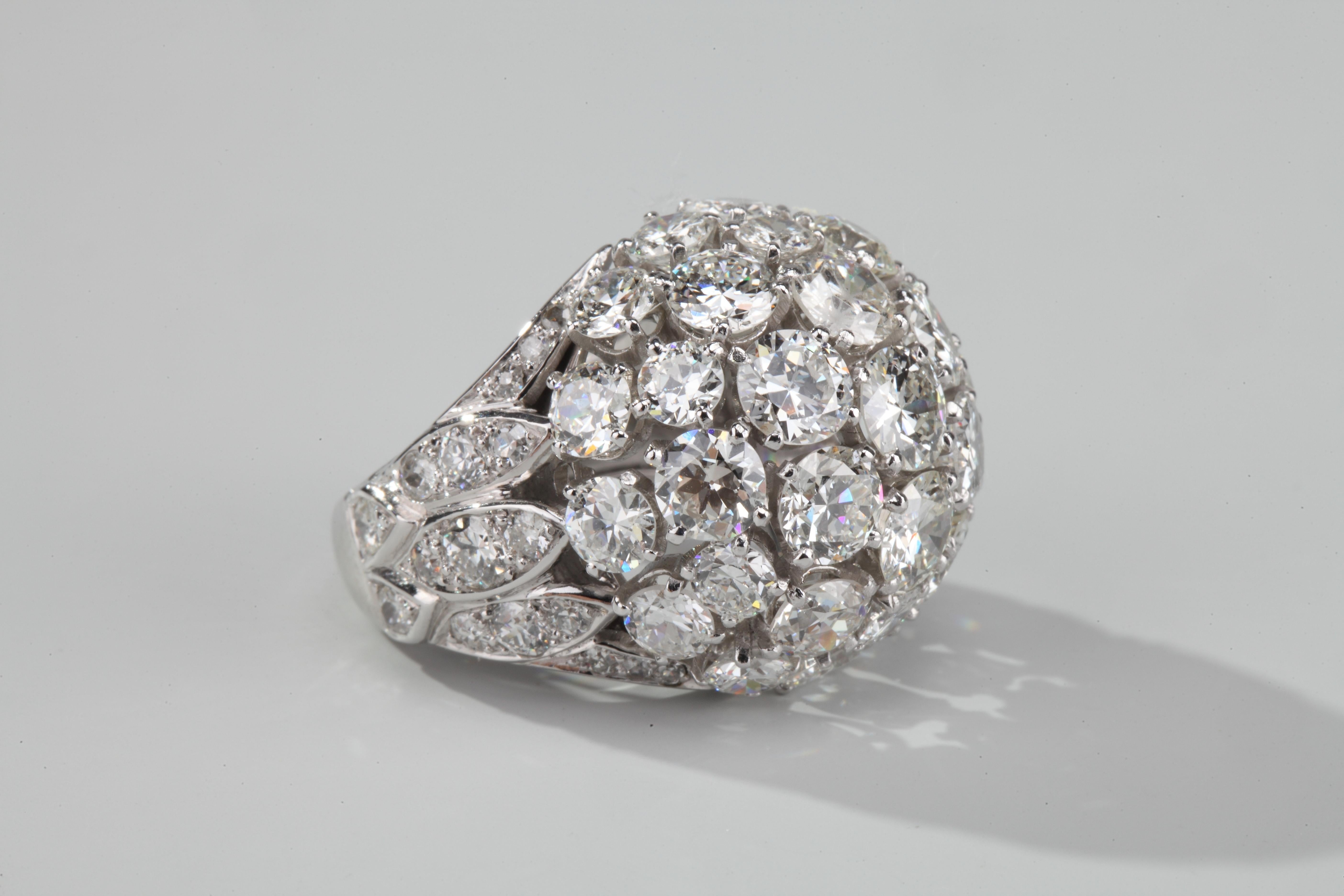 Beautiful platinum cocktail dome ring set with brillant-cut diamonds.
Weight of diamonds around 7.5 ct F-G vs color.
Circa 1950.
Size US 5,5-6 with inner circle.