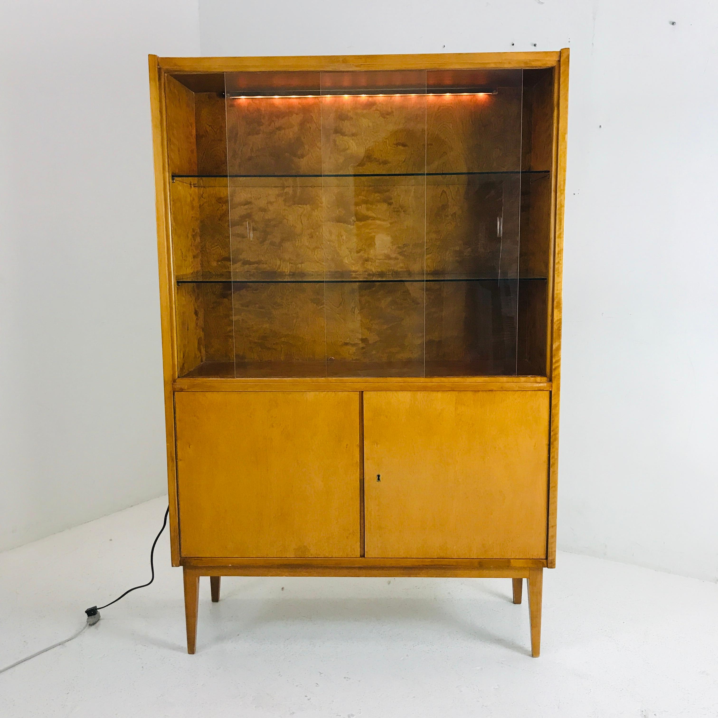 1950s French display cabinet with glass shelves.