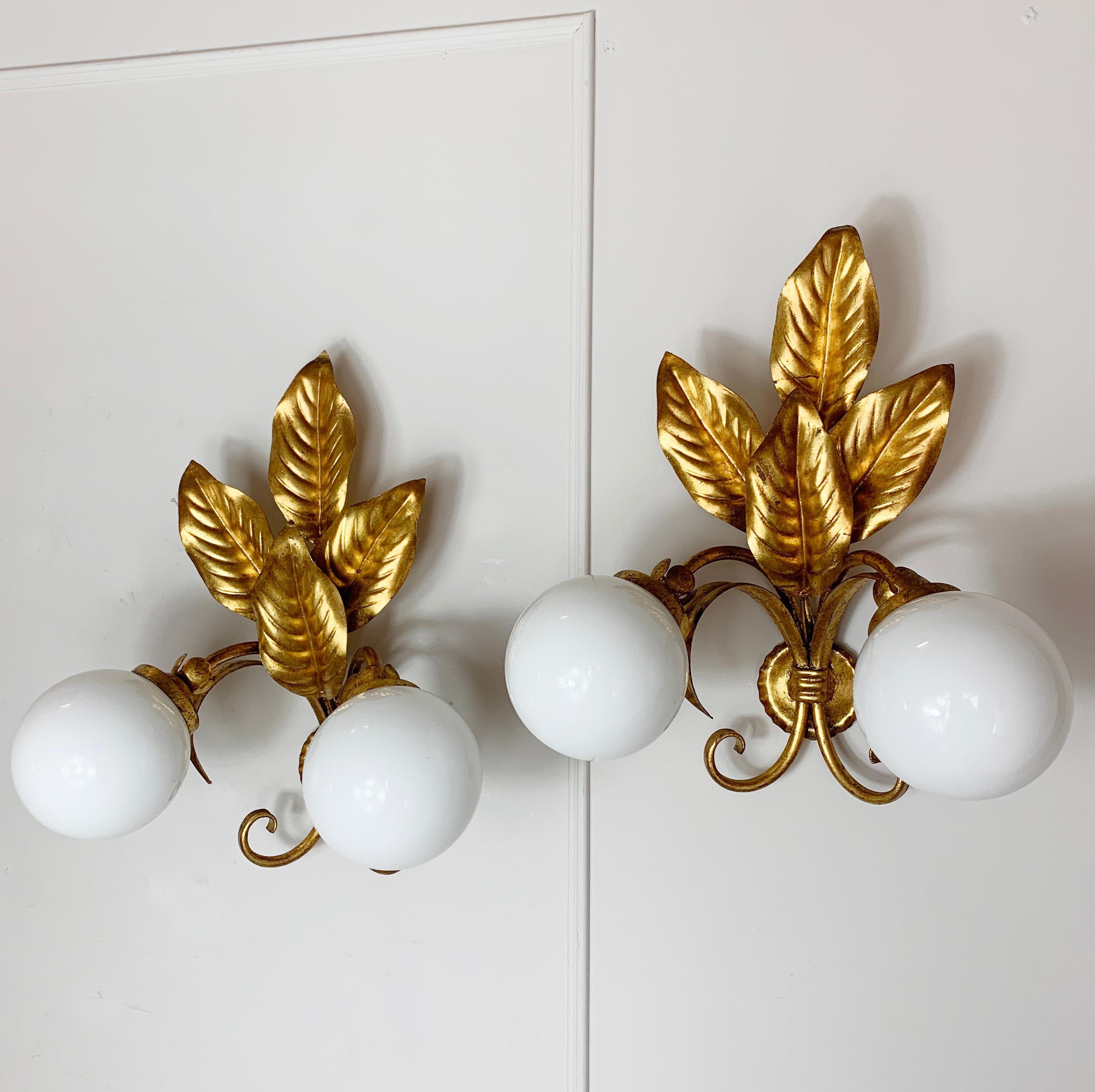 1950s French Feuilles D’or wall lights
Stunning pair of gilt finished, double wall lights, with opaque glass full globe shade
These look beautiful on or off, and when illuminated give off a wonderful glow
Made in France in the 1950s these lights