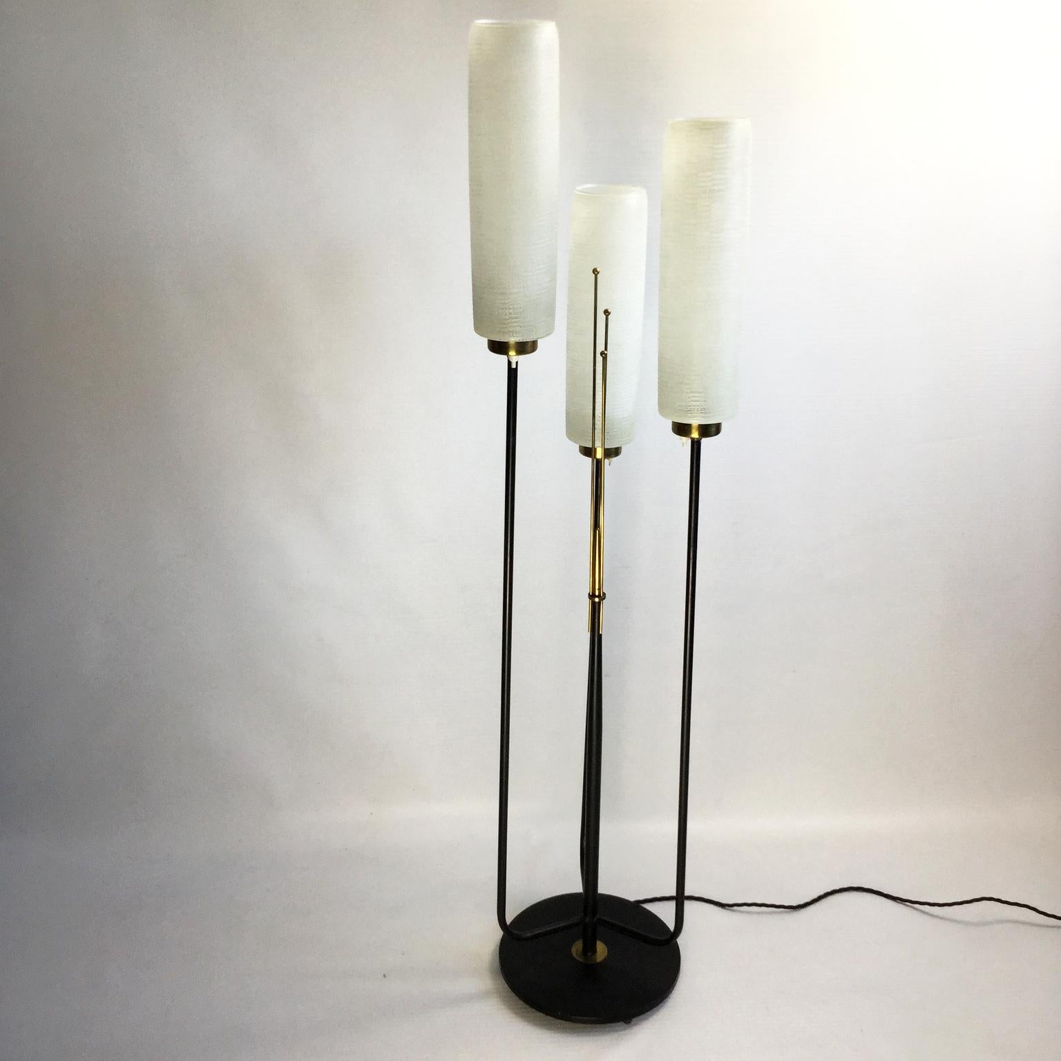 French, 1950s floor lamp with the original large shades with a 
Switch on each arm
Rewired with black cotton-insulated cable.