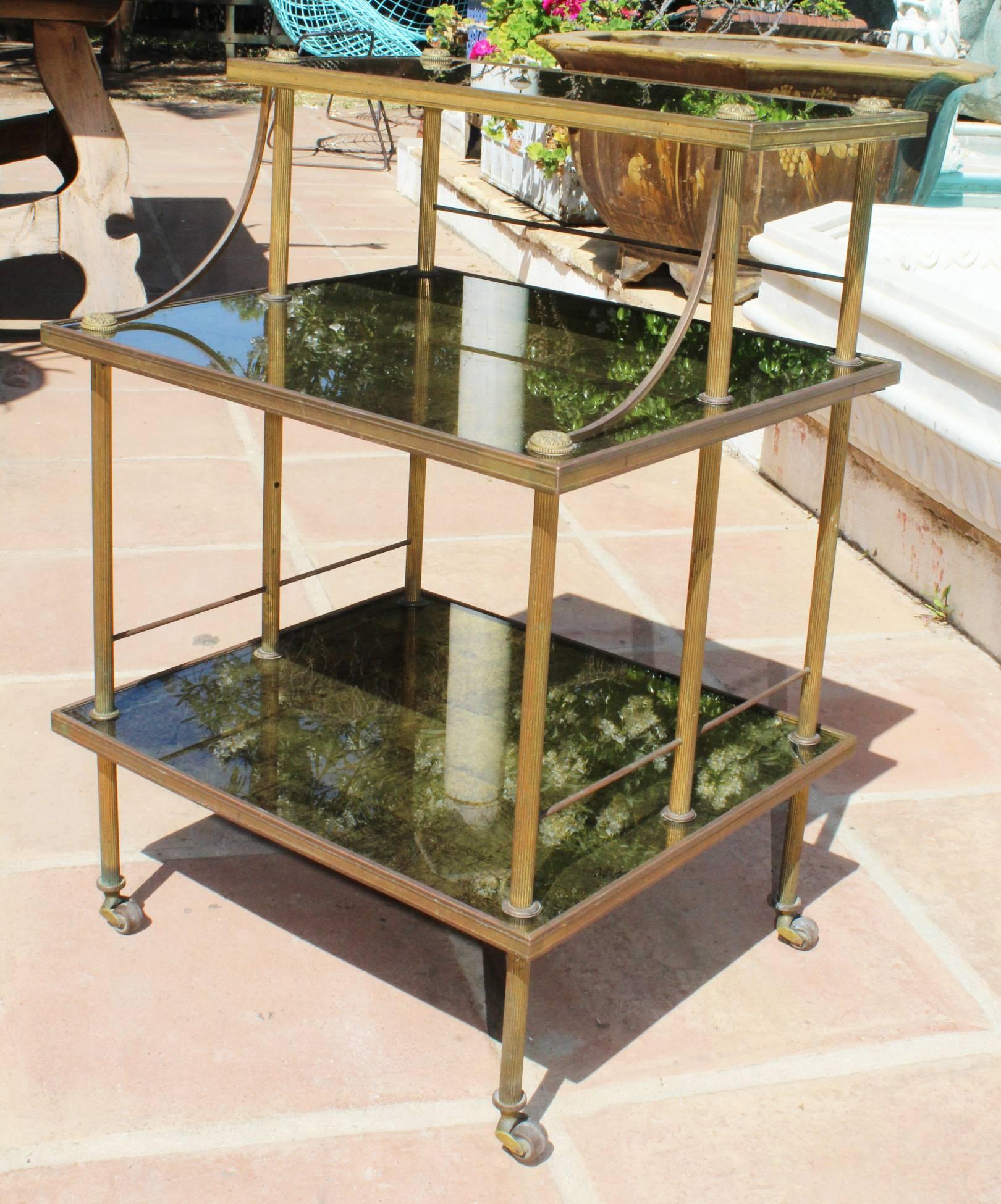 1950s French gilded brass and glass food trolley.
 