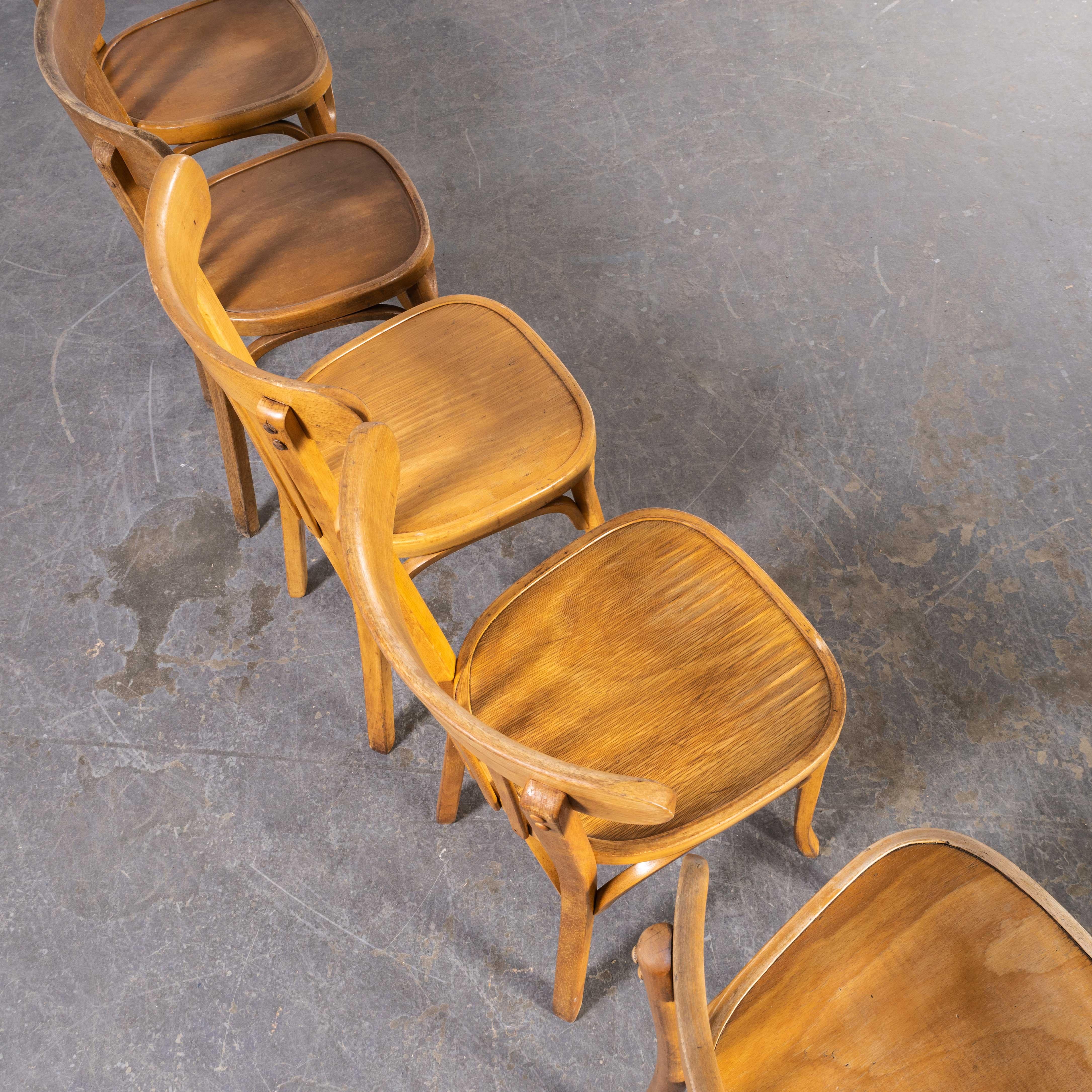 1950s French honey colour dining chairs – harlequin set of five
1950s French honey colour dining chairs – harlequin set of five. Classic beech bistro chair made in France by the maker Baumann. Baumann is a slightly off the radar French producer