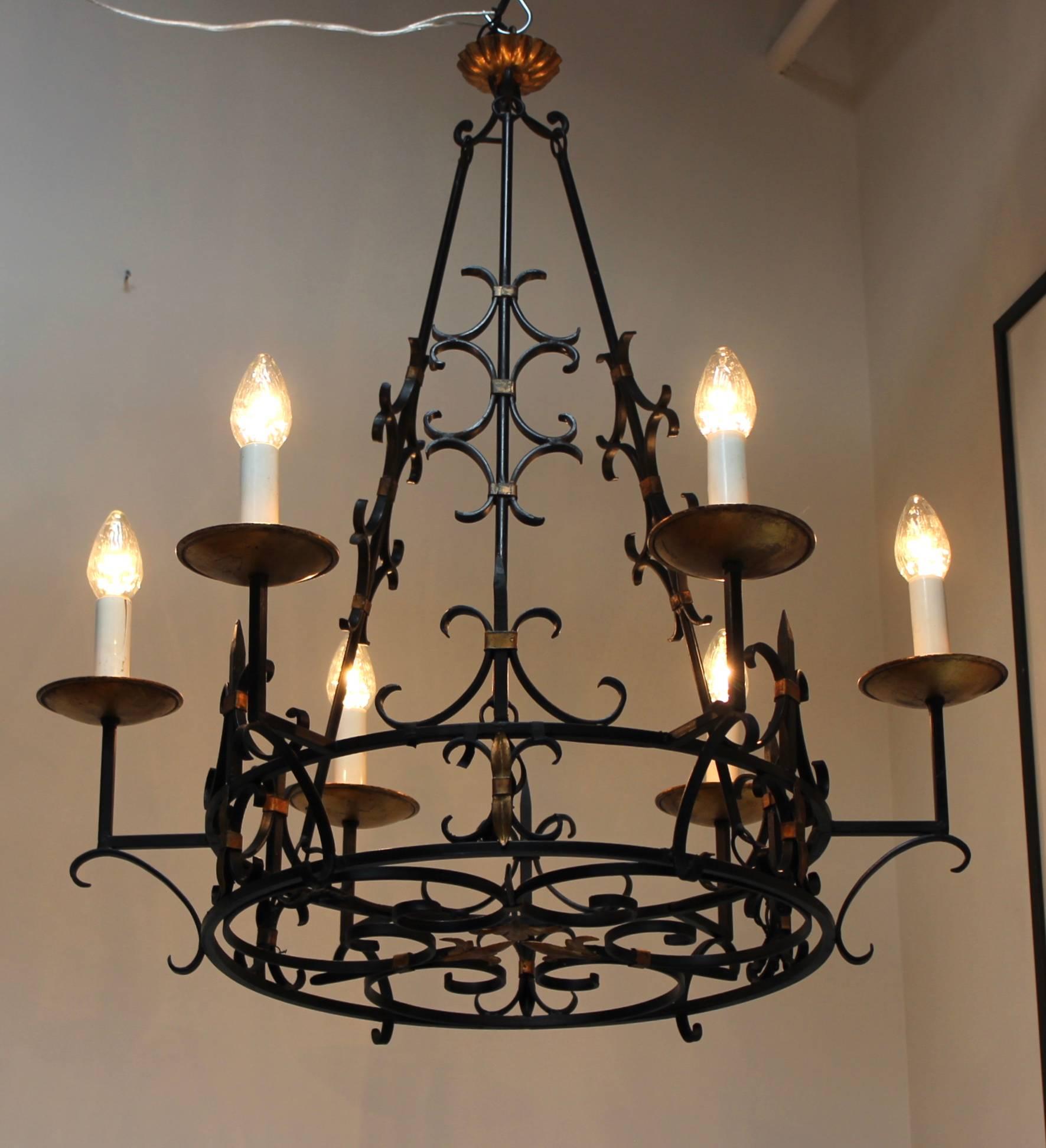 Large 1950s French iron and gilt six-light chandelier.
