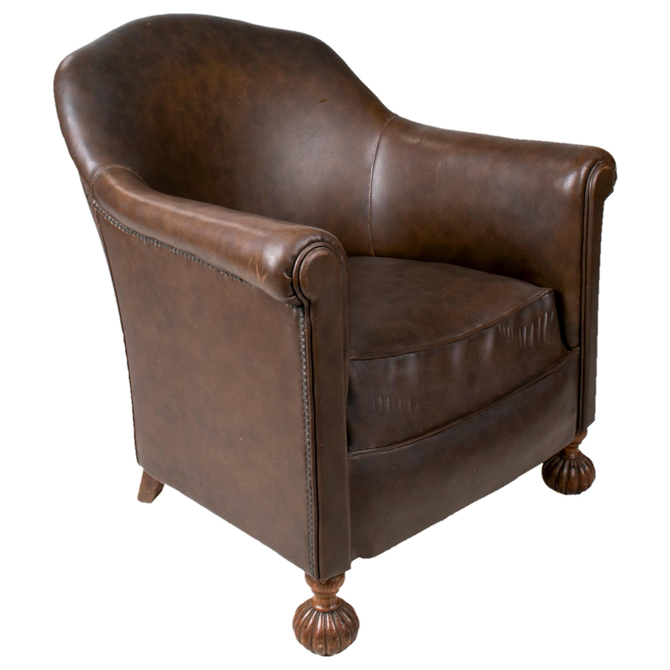 1950s French Leather imitation Armchair with Ornate Carved Wood