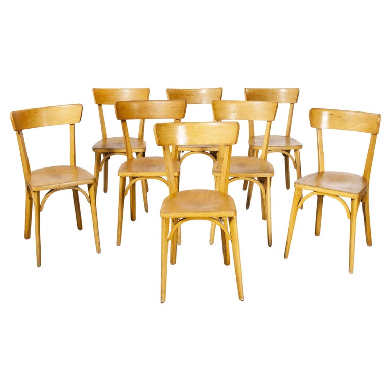 Ensemble de huit chaises de salle à manger en bois cintré de Luterma,  fabriquées en France dans les années 1950, modèle OB - En vente sur 1stDibs