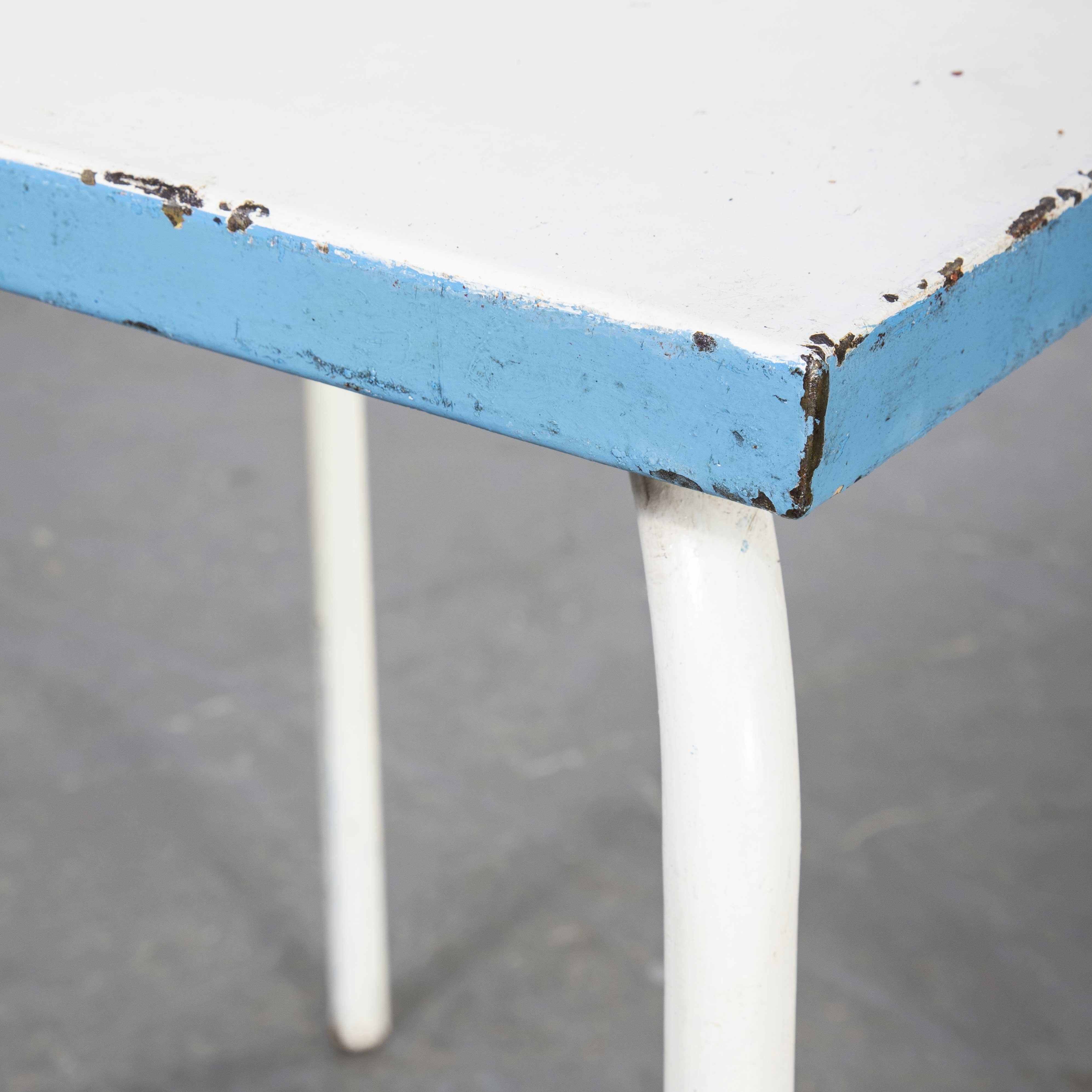 1950’s French metal garden table blue and white (model 836.2)

1950’s French metal garden table blue and white (model 836.2). Classic stacking metal outdoor table used on terraces and in gardens throughout France. Very practical because they can be