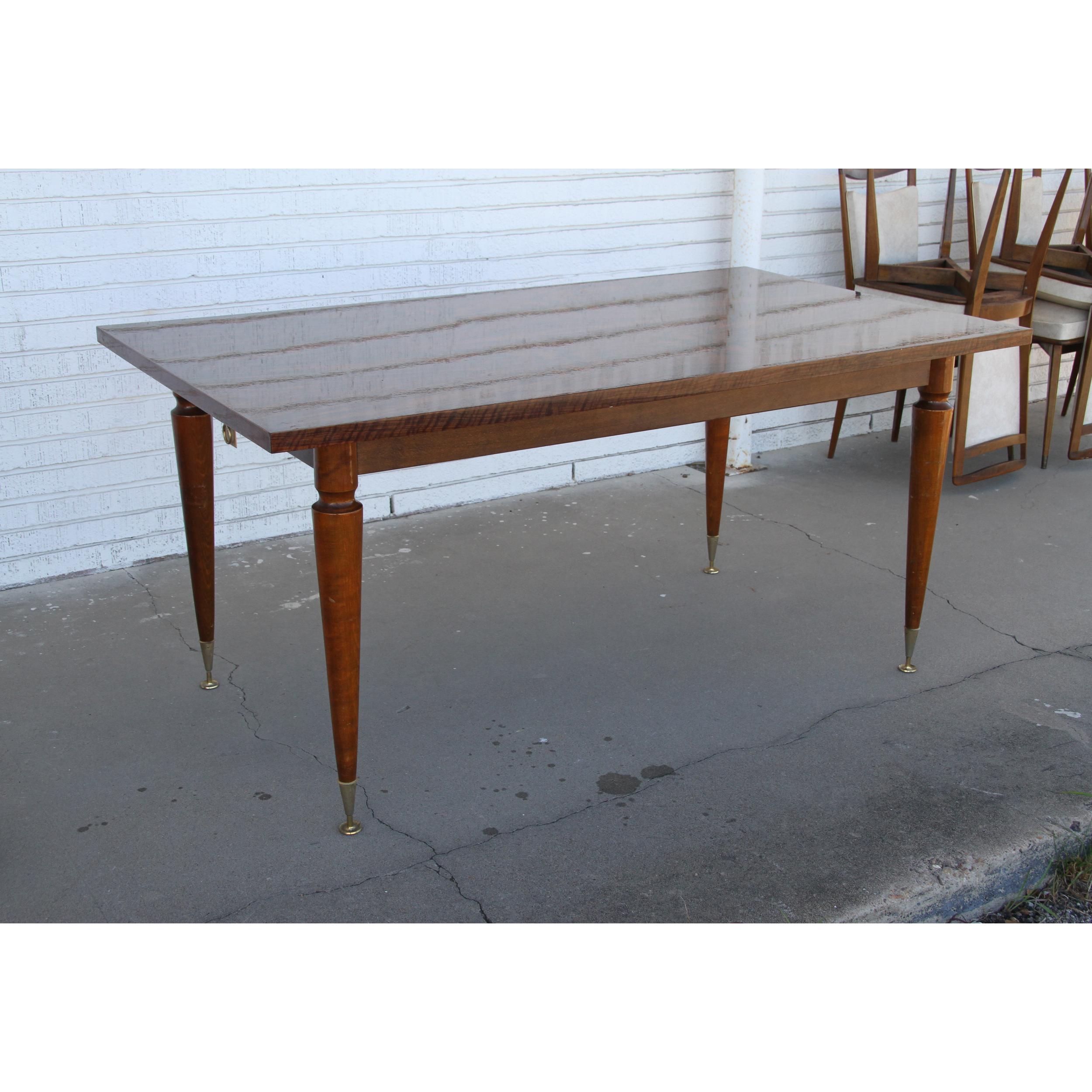 A fabulous designer French Mid-Century Modern dining table 

handcrafted in France, circa 1950s

Rosewood Finish 