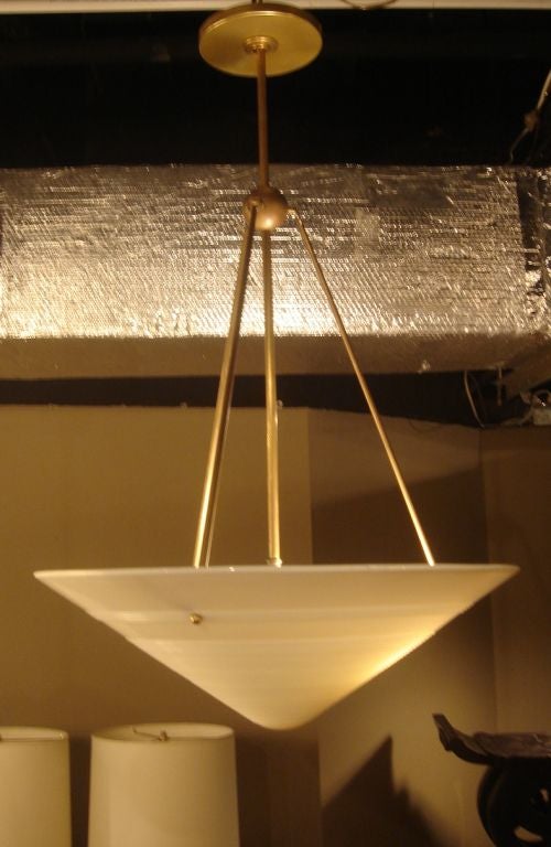 Opaline glass and brass hanging light fixture. USA, circa 1950. 

Antique ribbed glass shade complemented by custom brass hardware.

Dop hight may be customized; allow 4 weeks for customization.

Dimensions: 
Glass shade: 19