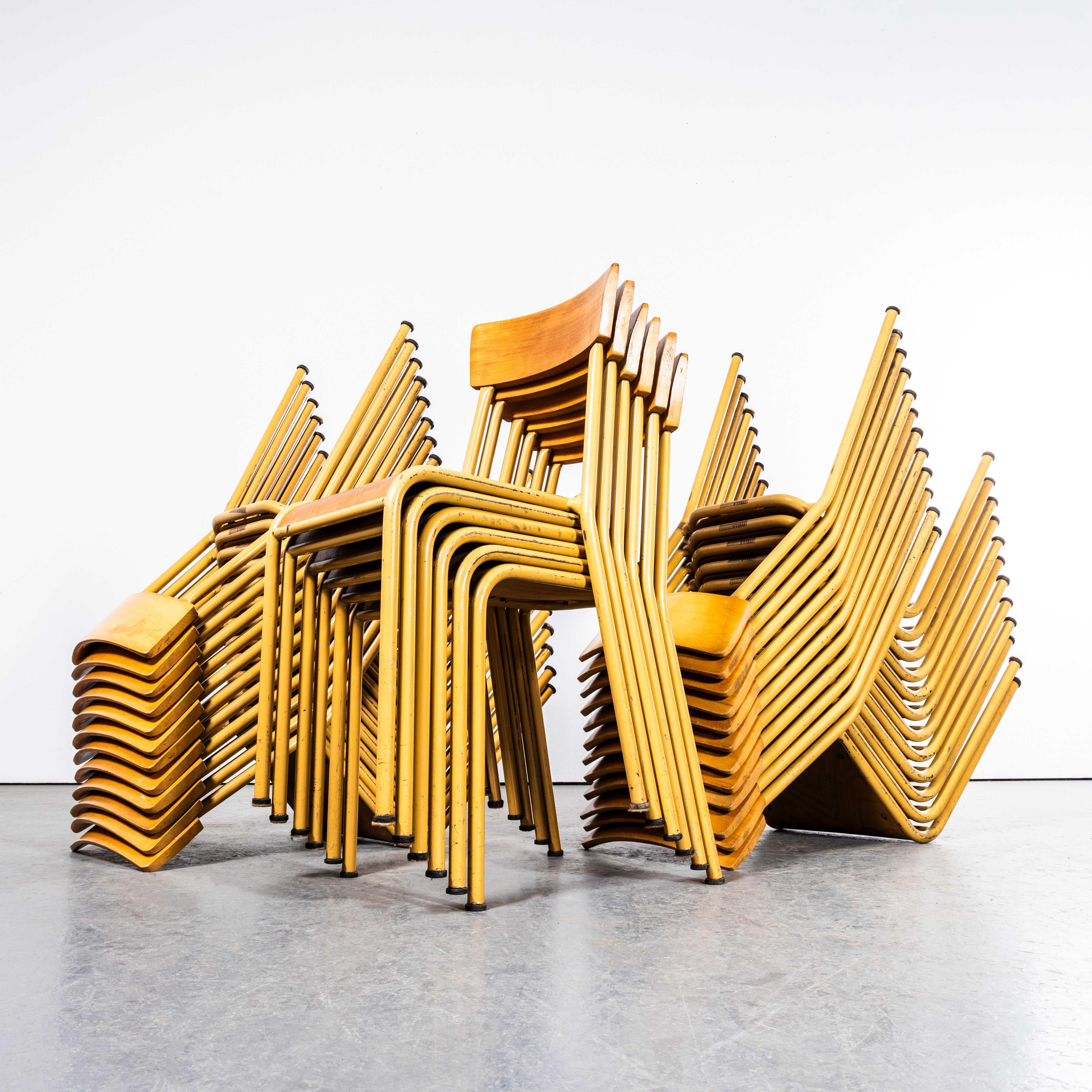 1950’s French Mustard Stella Stacking Dining Chairs. 

Stella is a lesser known French chair manufacturer founded originally in 1912 as the Auriol company making wheelbarrows. In 1922 Léon Ruisseau used his technical knowledge to create a stronger