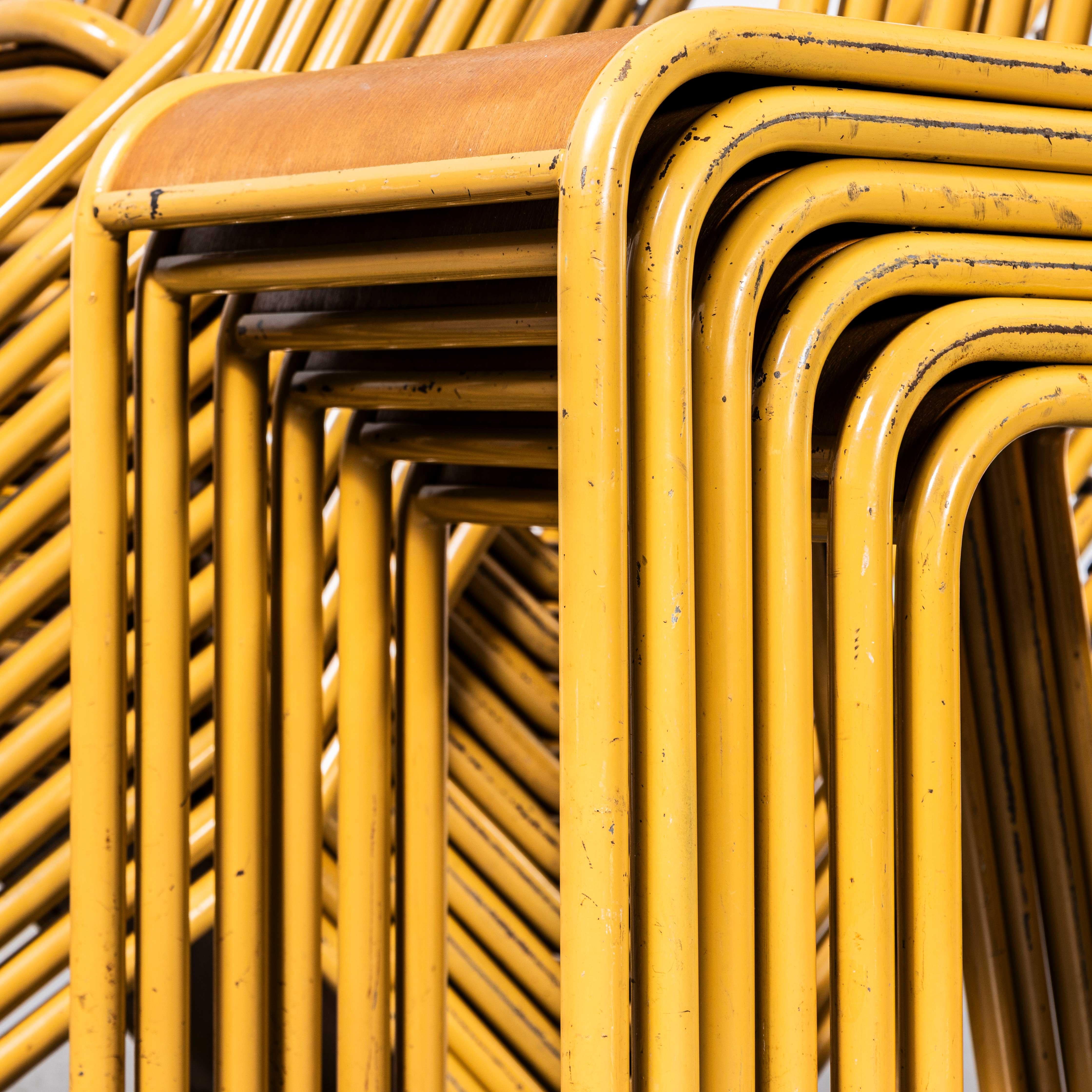 Steel 1950's French Mustard Stella Stacking Dining Chairs For Sale