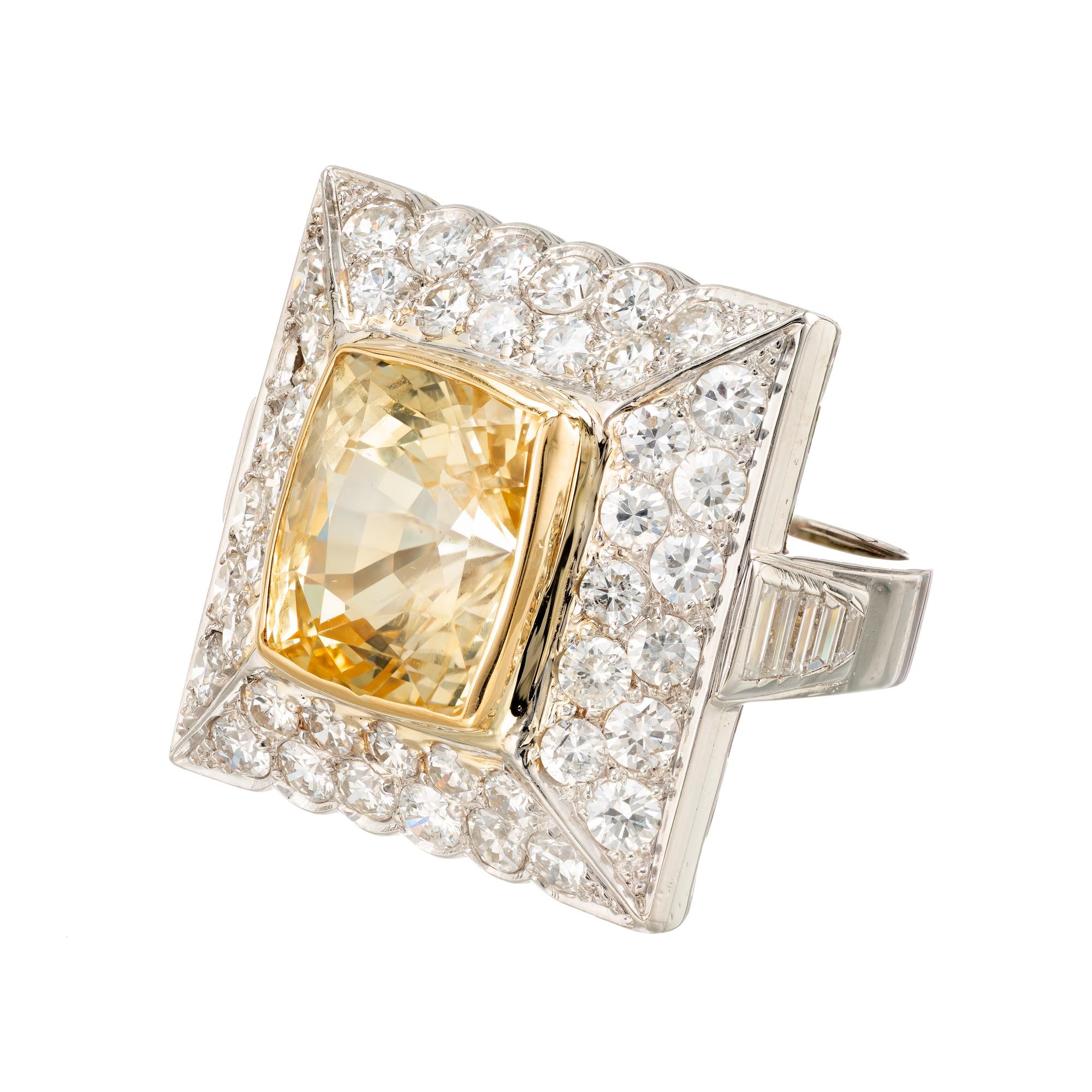 1950’s Yellow sapphire and diamond cocktail ring. Set in a platinum square top with a GIA certified natural no heat yellow center sapphire with Pavé set diamonds. 

1 cushion yellow Sapphire, approx. total weight 13.81cts, no heat, GIA certificate