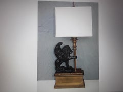 1950's French Neoclassical style "Winged Lion Holding Lamp"  Table Lamp