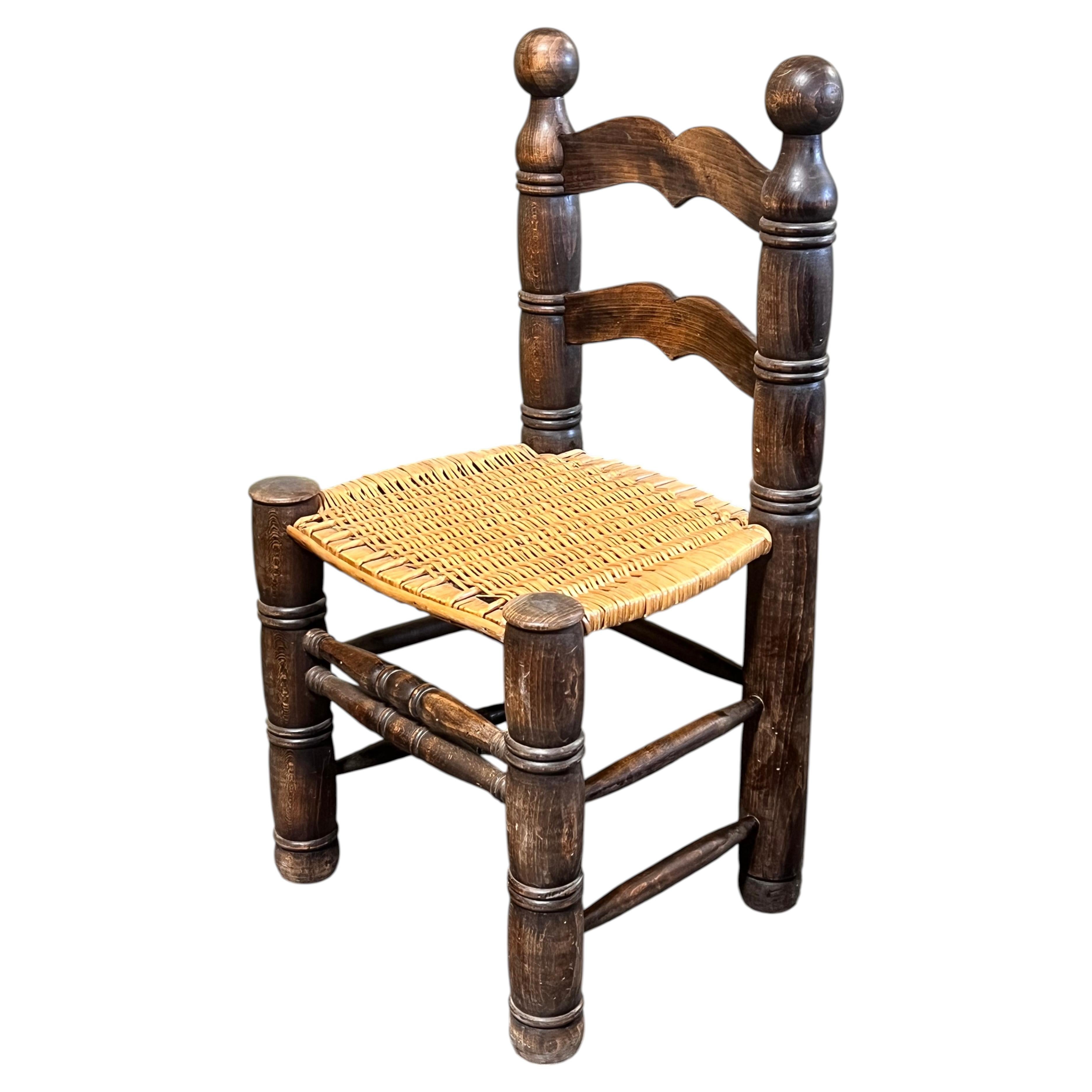 1950’s French Oak Chair with Rush Seat by Charles Dudouyt For Sale