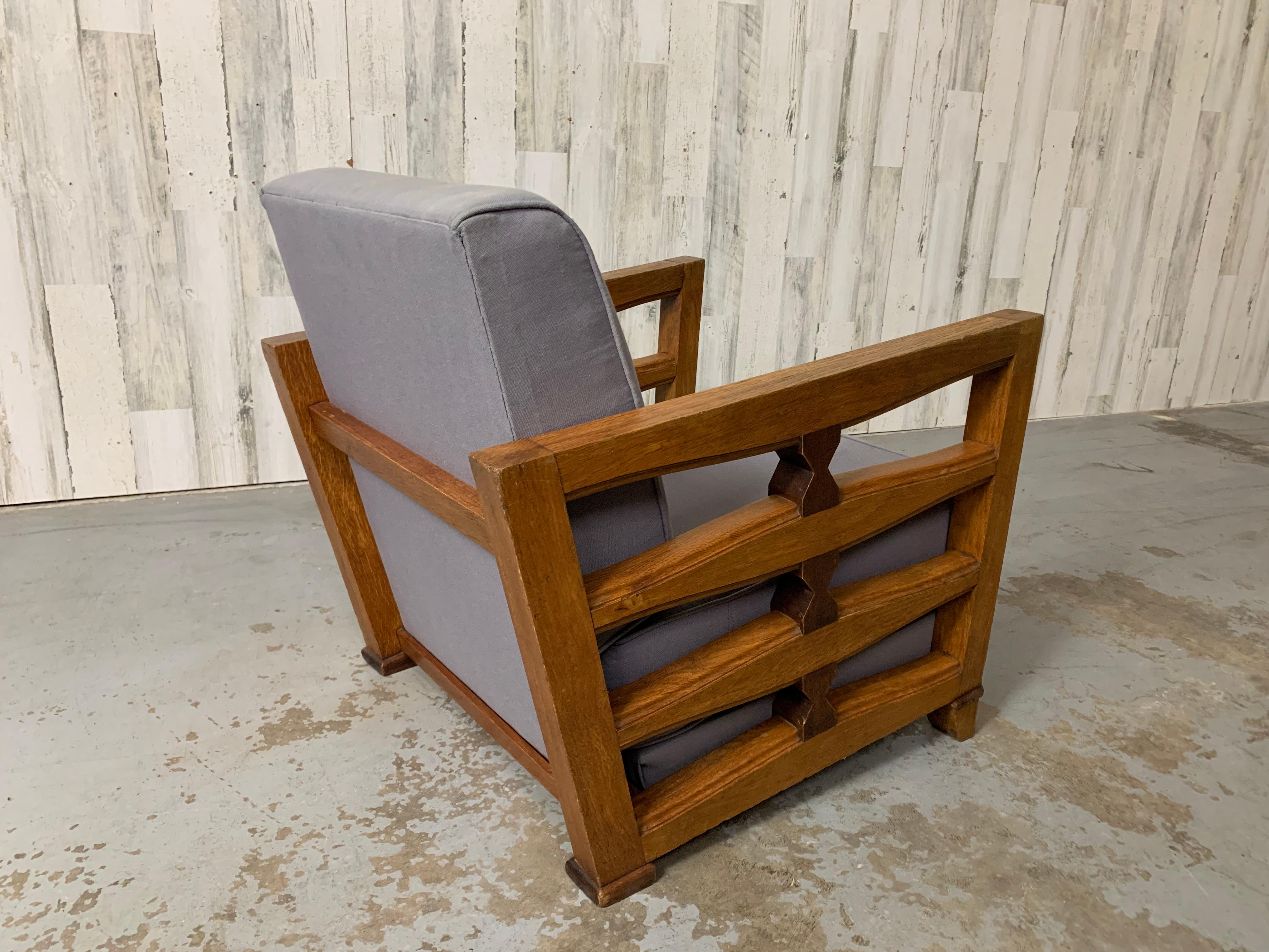 French modernist lounge chair for petite people or children. A dramatic combination of oak and mahogany and upholstery. Child's chair seat height is 12.25.