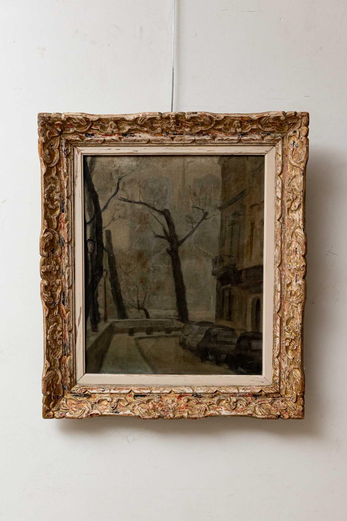1950s French oil painting of a Parisian winter scene in its original carved wood frame. The bleak but calm winter scene featuring bare, stark trees which is by the Seine river in Paris. Artist unknown. Unsigned.
The oil and frame are in very good