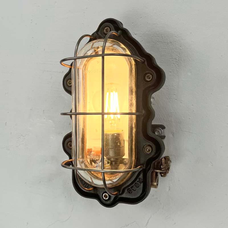 Industrial 1950's French Oval Black Cast Steel Bulkhead Light by Perfeclair of Paris For Sale