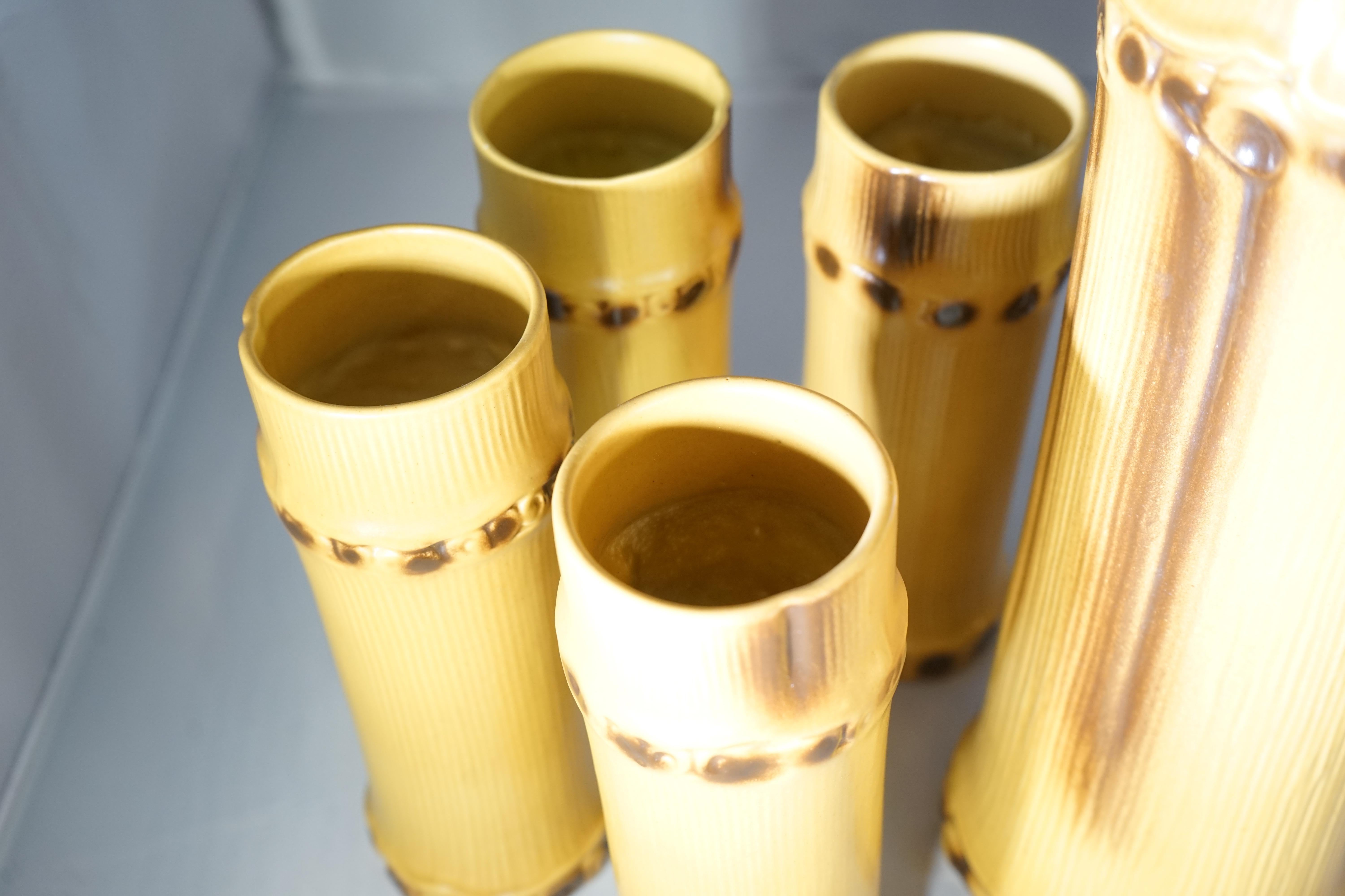 1950s ceramic faux bamboo serveware set by French artist Pol Chambost. Features a pitcher and 8 matching sand color faux bamboo glasses.