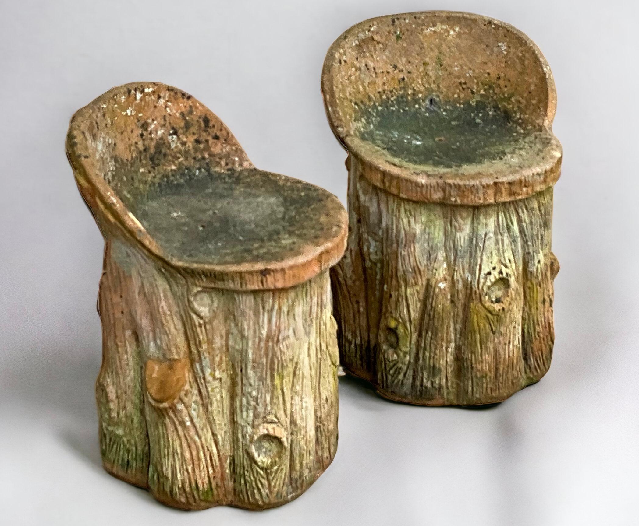 I love these! This is a pair of 1950s French faux bois form terracotta garden seats. They have garden patina and are unmarked. 