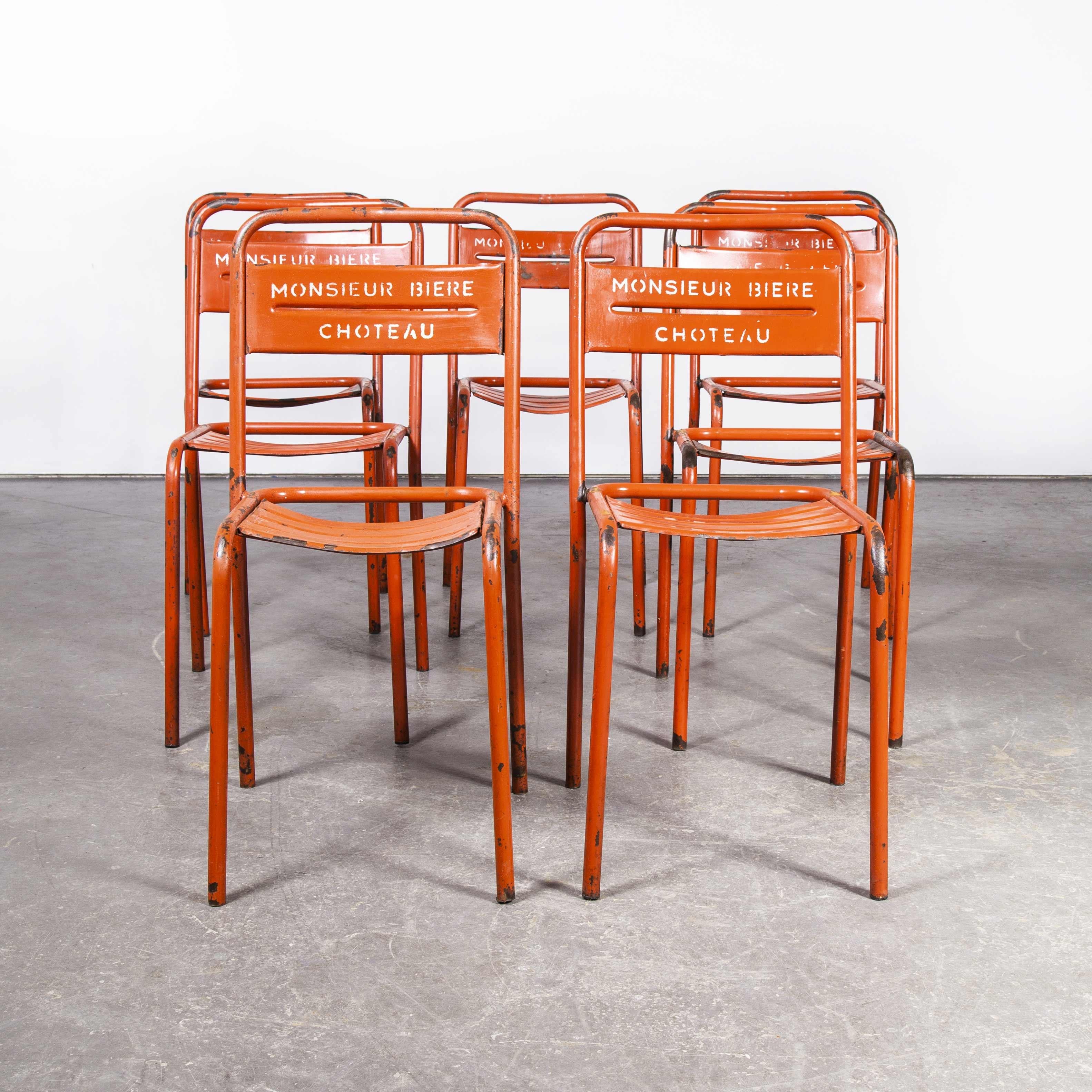 red metal outdoor chairs
