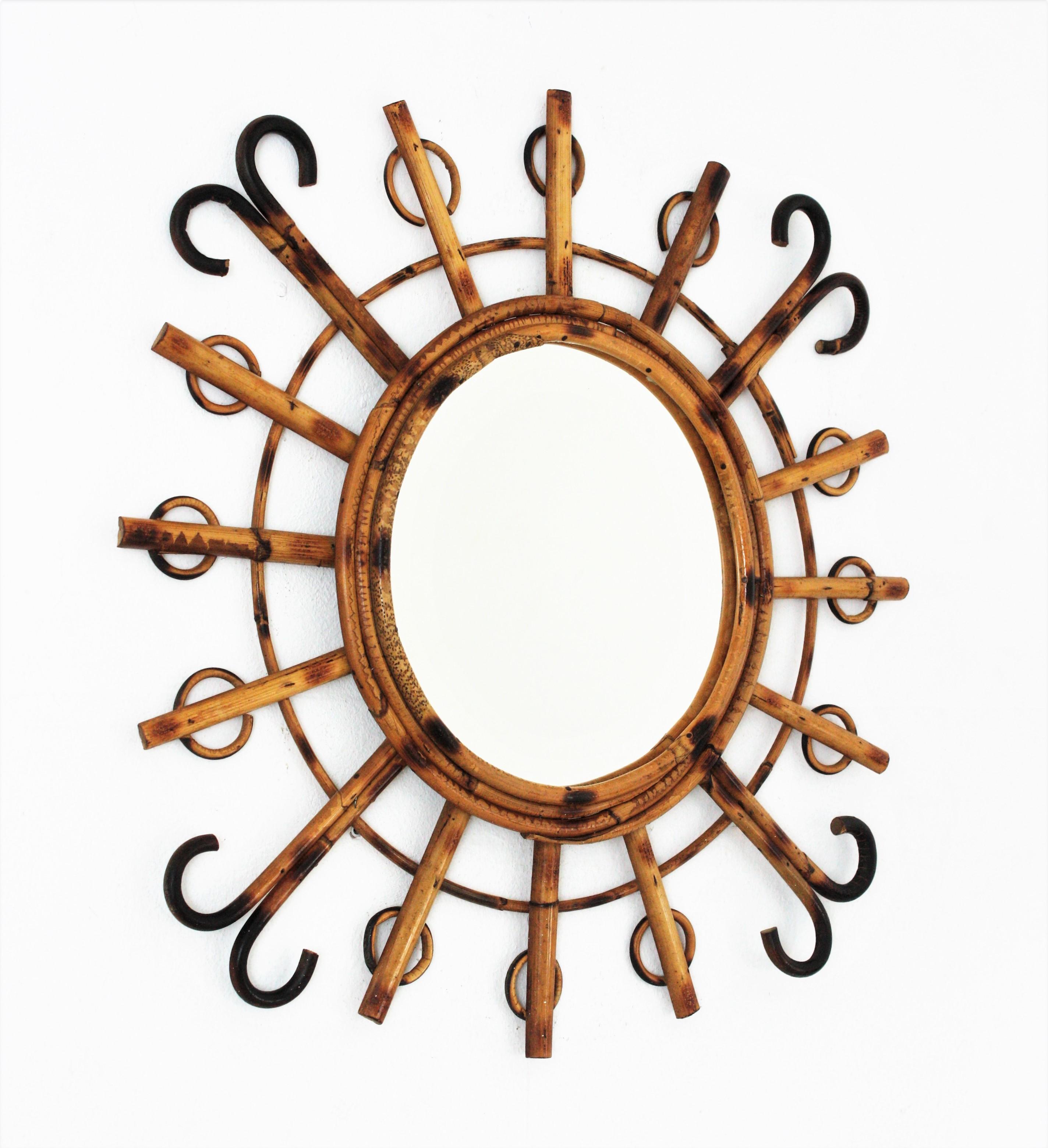 Hand-Crafted 1950s French Riviera Rattan Sunburst Starburst Mirror  For Sale