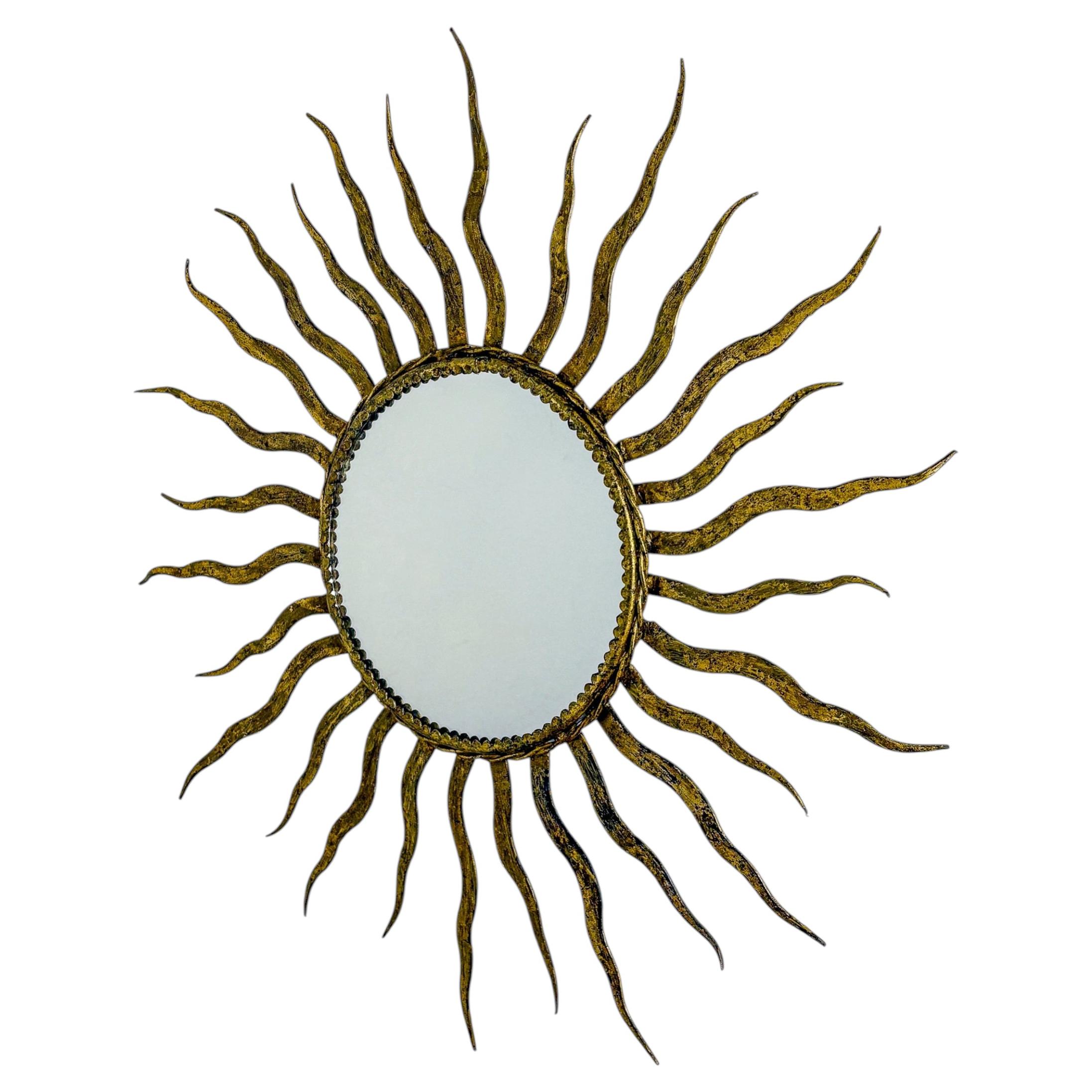 1950s French Sunburst Mirror in Gilt Iron, Oval Brutalist Design For Sale