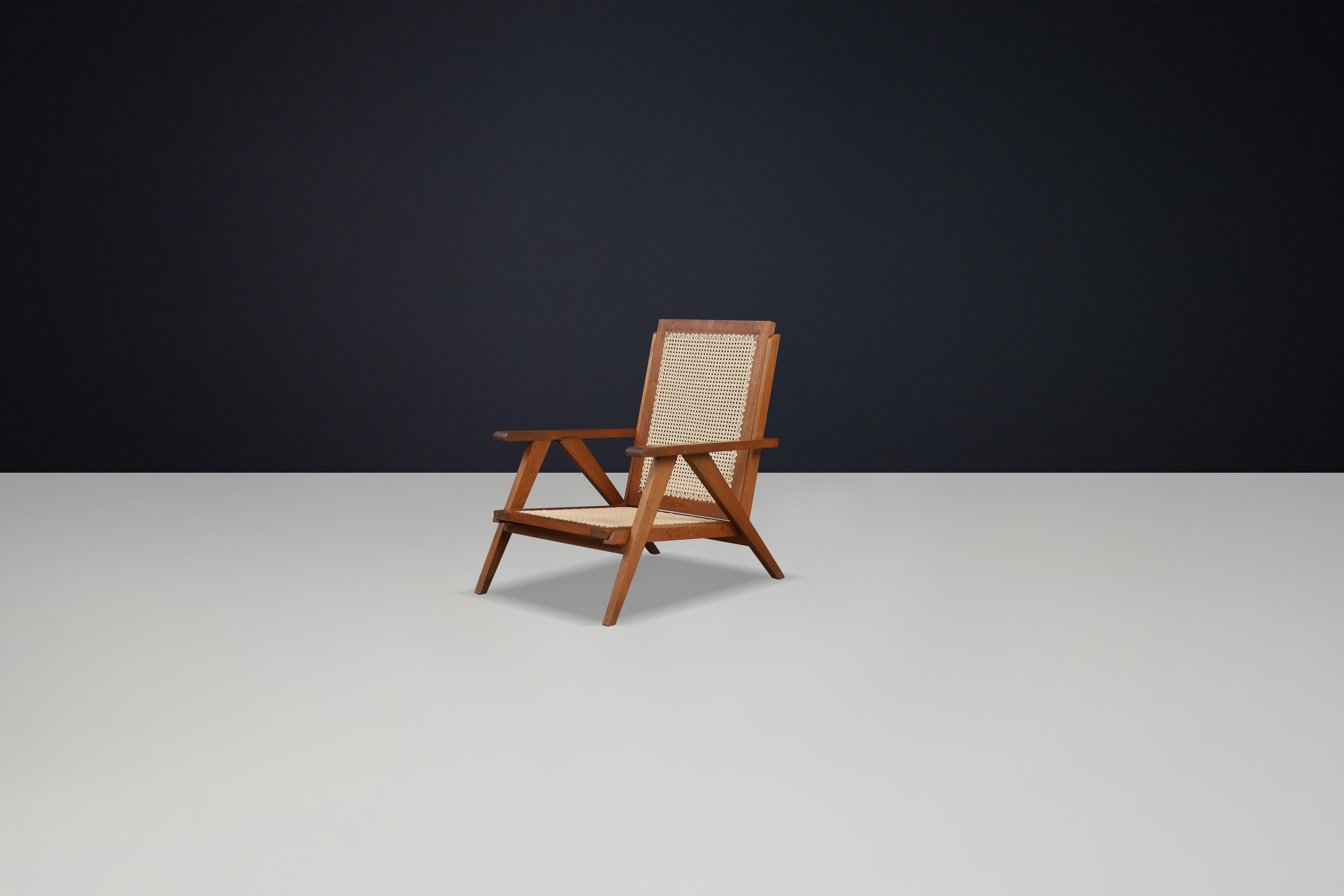 Canna Poltrone francesi in teak e canna degli anni '50 - Icone della modernità di metà secolo in vendita
