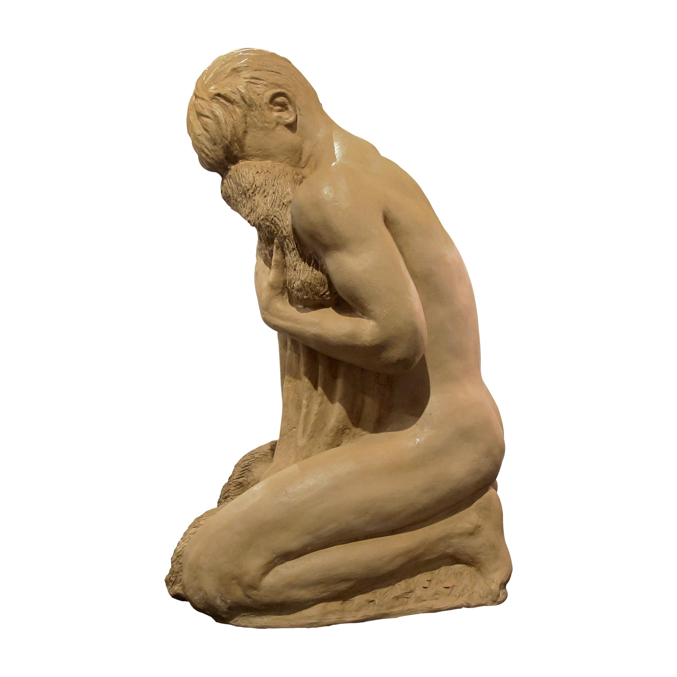 Unglazed 1950s French Terracotta Sculpture Of A Man Kneeling For Sale