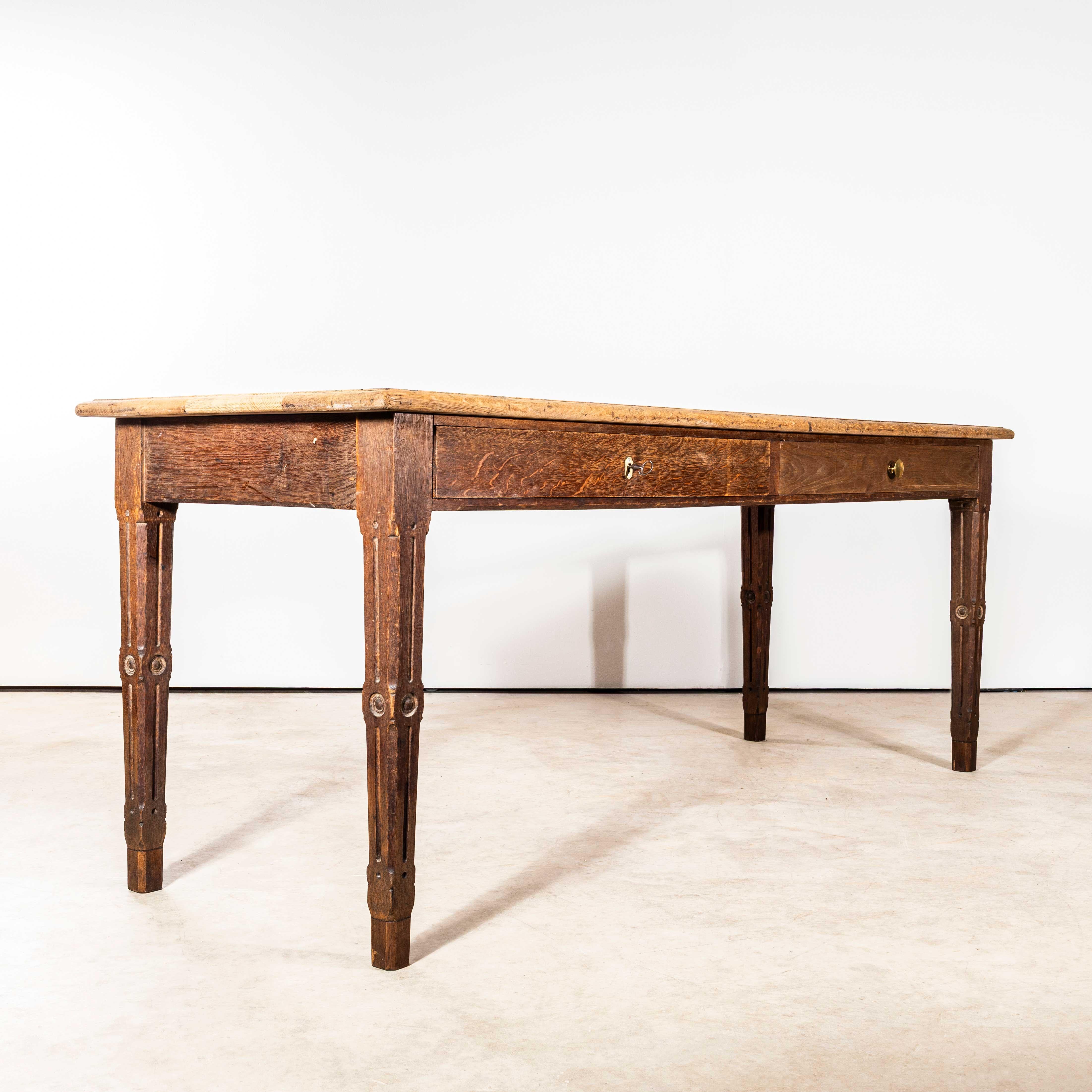 1950’s French Two Drawer Farmhouse Rectangular Dining Table. 
Good honest French farmhouse table in a practical size made with well figured oak timber. The table is very well made with dowelled joints and well proportioned reeded legs. The table has
