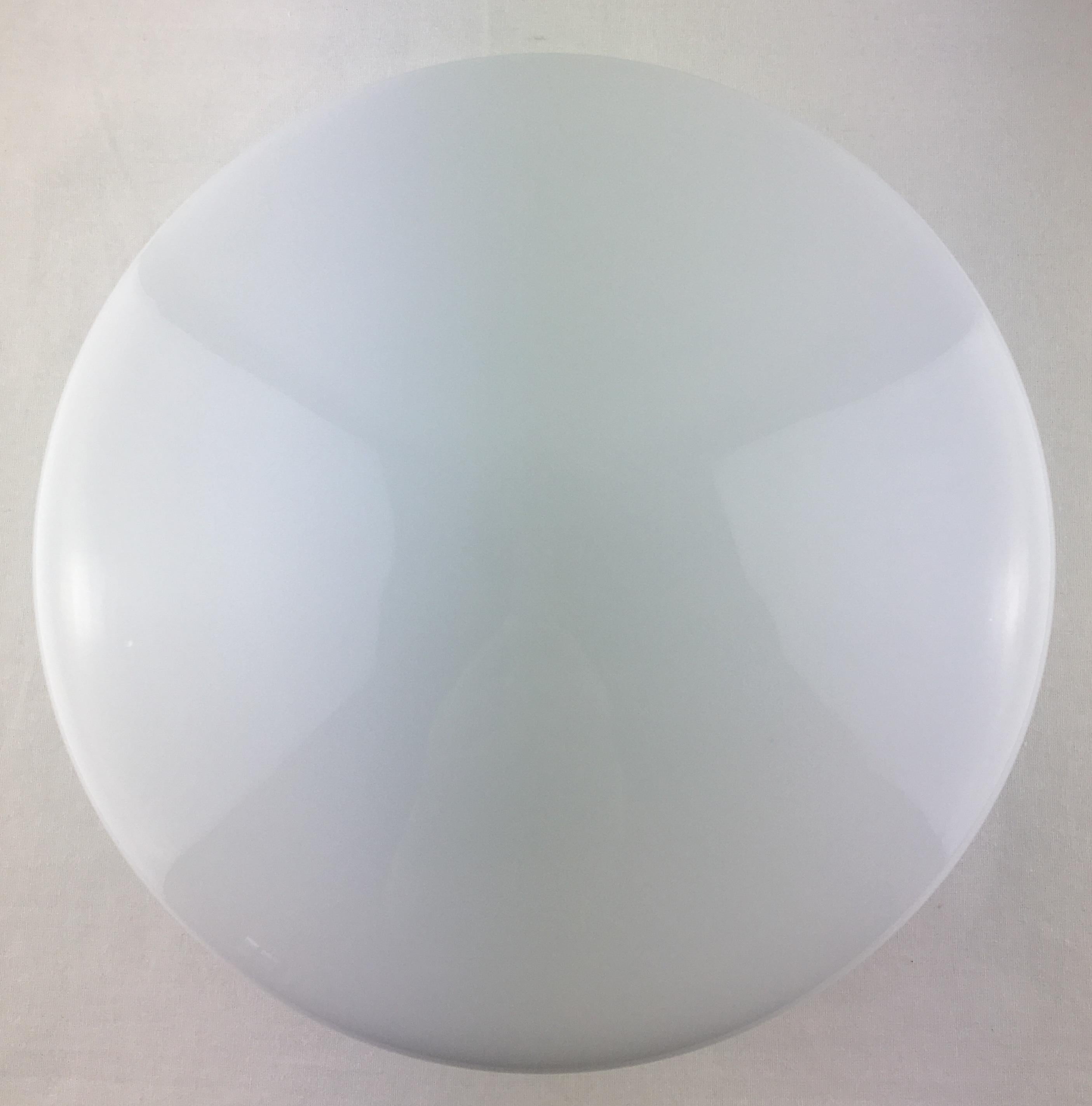 French modernist opaline and chrome pendant.

Beautiful white opaline pendant that evokes a Chinese lantern. Round and smooth, this French suspension is both discreet, timeless and original. It would look wonderful in a room with colorful walls.