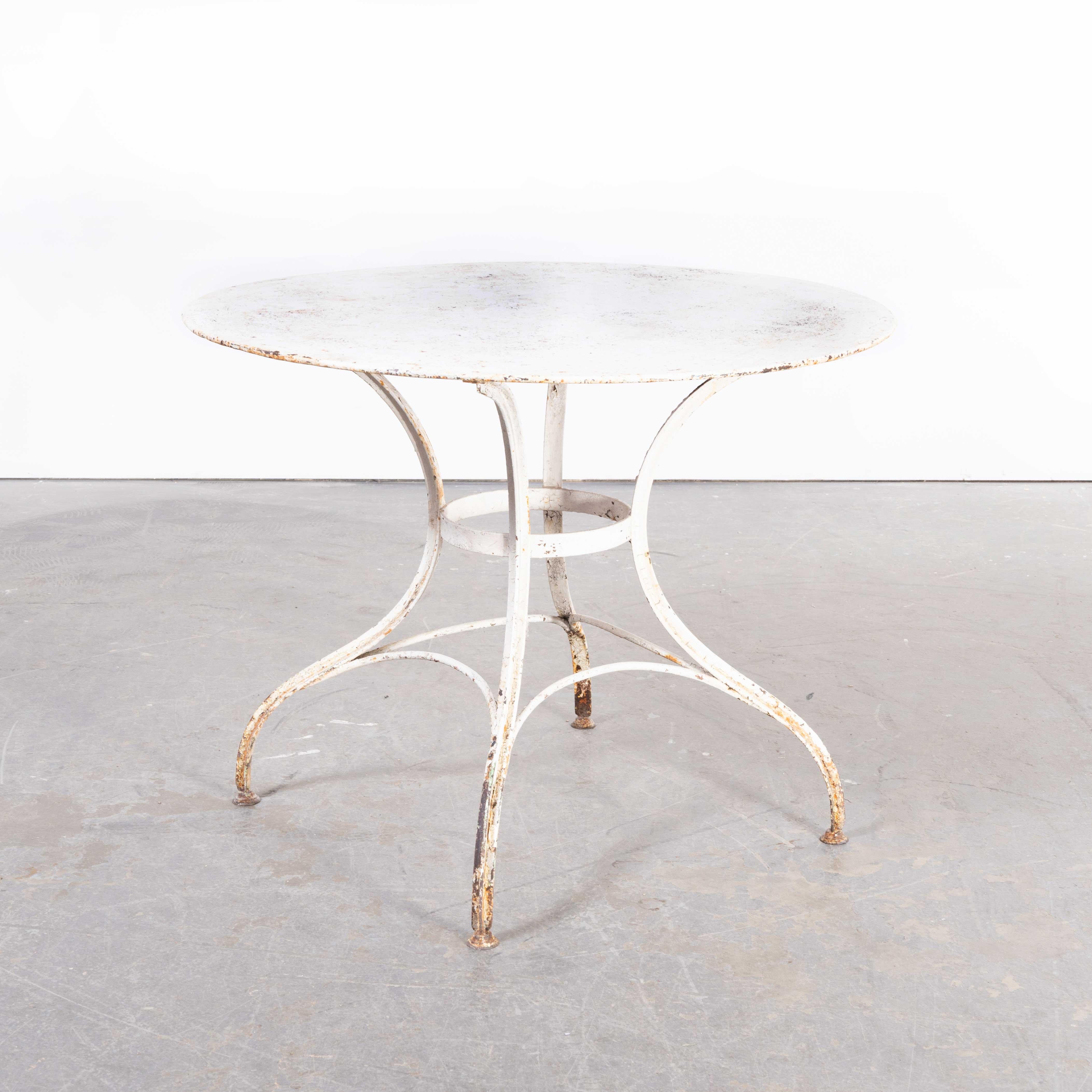 1950’s French white round garden table
1950’s French white round garden table. Classic French round metal outdoor table with a good solid top. The base is made from forged T section steel with a connecting and strengthening rod support. A good