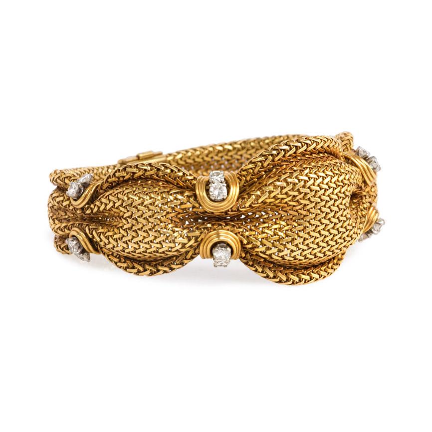A mid-century woven gold bracelet of cinched fabric design with diamond embellishment, in 18k.  France, maker's mark for Goldberg Frères.  Atw 1.12 ct. diamonds.