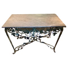 1950s French wrought iron and marble console table with leaf decoration