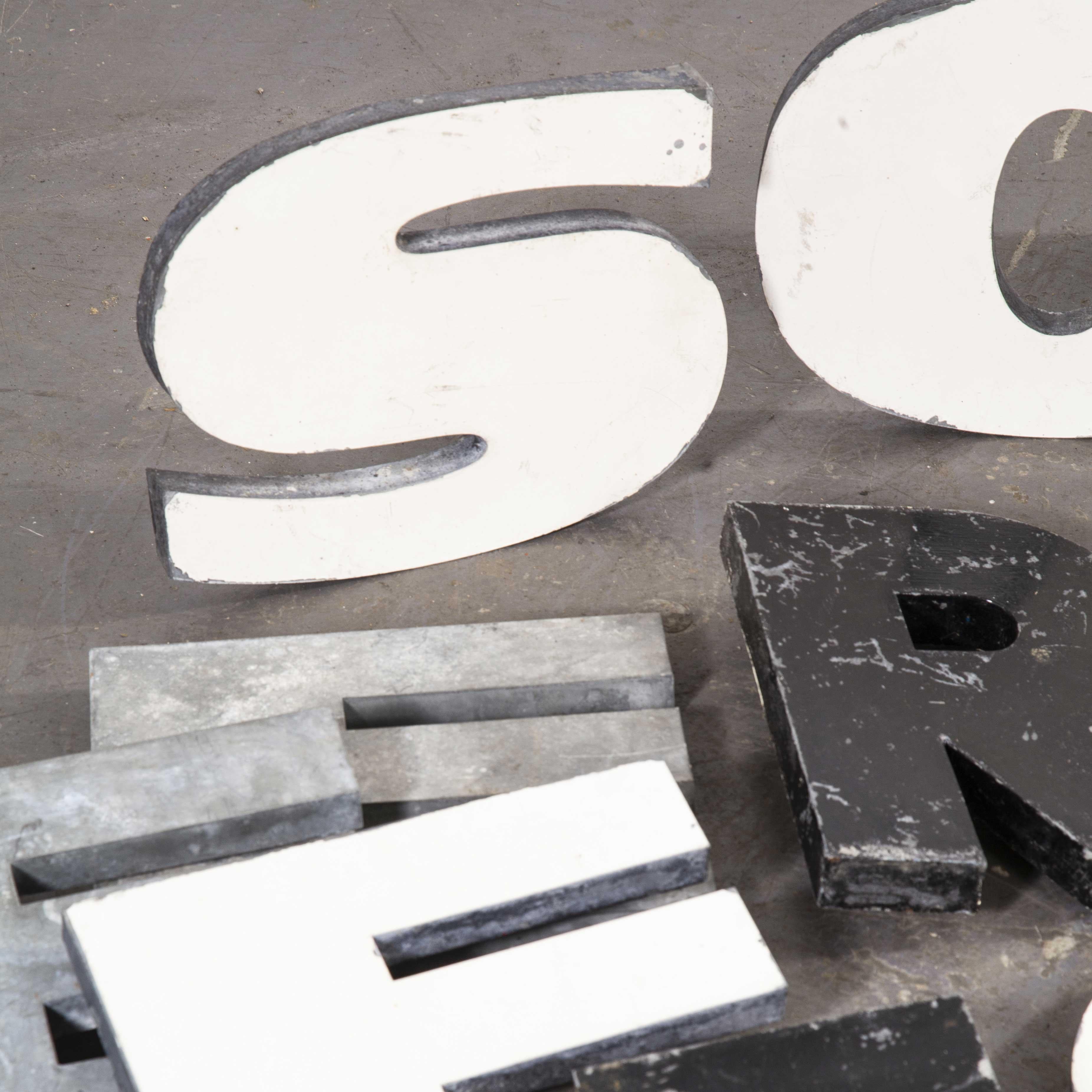 1950s French zinc letters – Letter Black E. We have 19 of these well worn and very beautiful zinc letters which look beautiful as decorative pieces in their own right or are frequently bought as customer initials or for anyone good on anagrams we