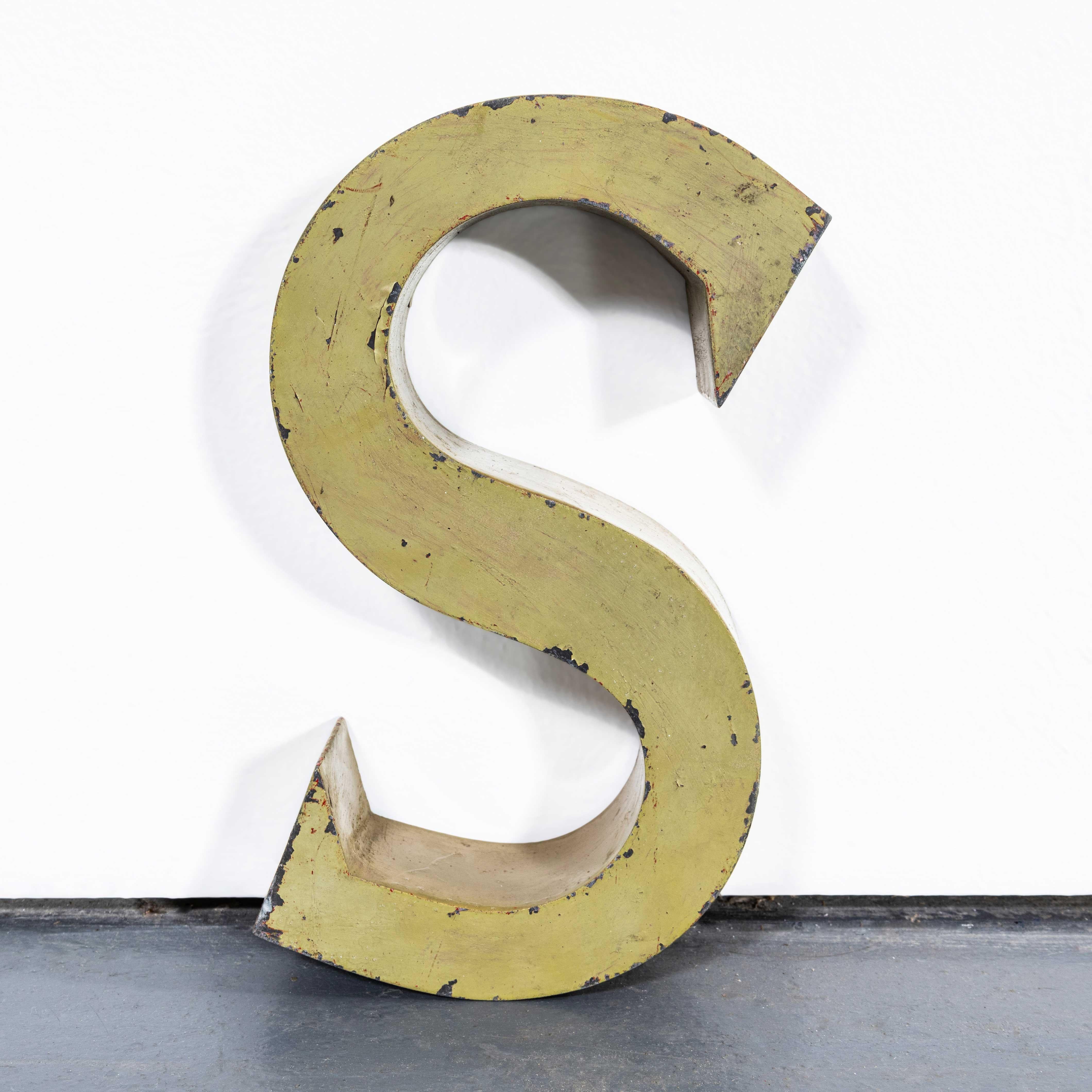 1950's French Zinc Letters - Letter Green S. 
We have 19 of these well worn and very beautiful zinc letters which look beautiful as decorative pieces in their own right or are frequently bought as customer initials or for anyone good on anagrams we