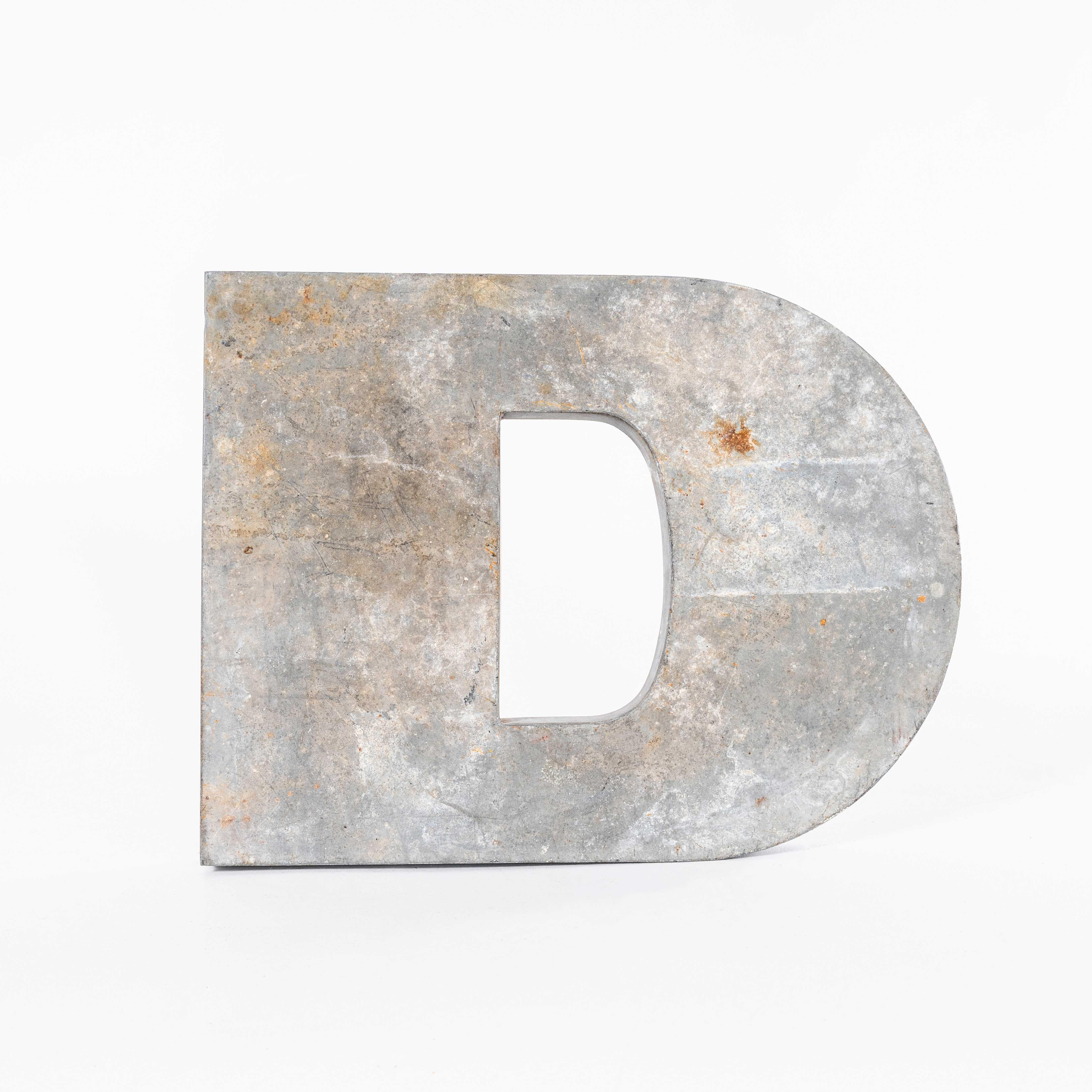 1950’s French Zinc Letters – Letter Zinc D. 
The letters have been handmade in sheet steel and zinc dipped. The letters are hollow on the reverse. This listing is for one letter only as specified in the description. The other images are included for