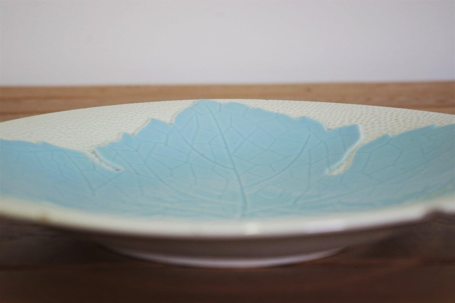 1950s Galvani Ceramic Decorative Plate - Italian Mid-Century Design

Add a touch of Italian mid-century charm to your collection with this ceramic decorative plate by renowned maker Galvani. Dating back to the 1950s, this piece showcases the