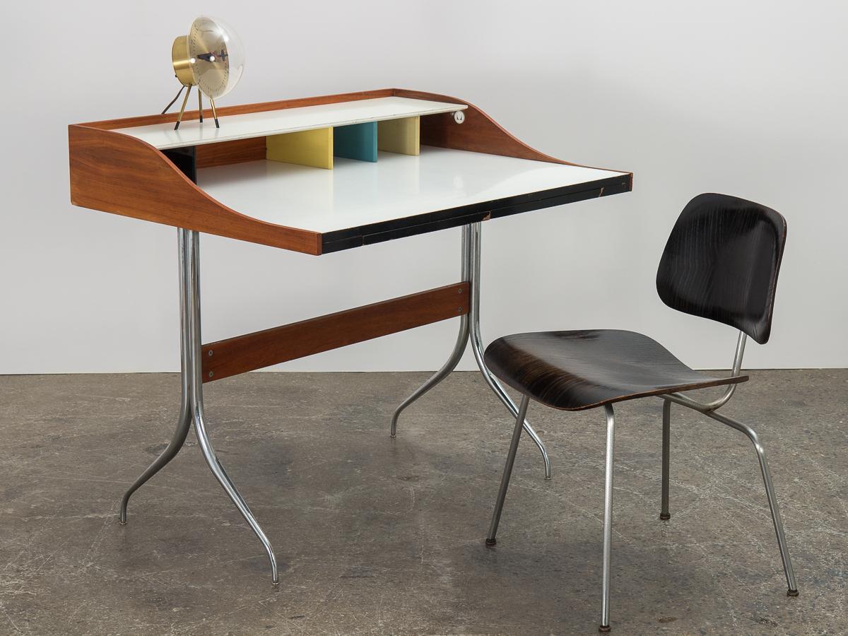 Original Swag leg desk, designed by George Nelson for Herman Miller. Colorful cubbyholes and molded drawers allow for a tidy and streamlined workspace. Our early example is in very good condition with some honest wear throughout. Sturdy chrome base