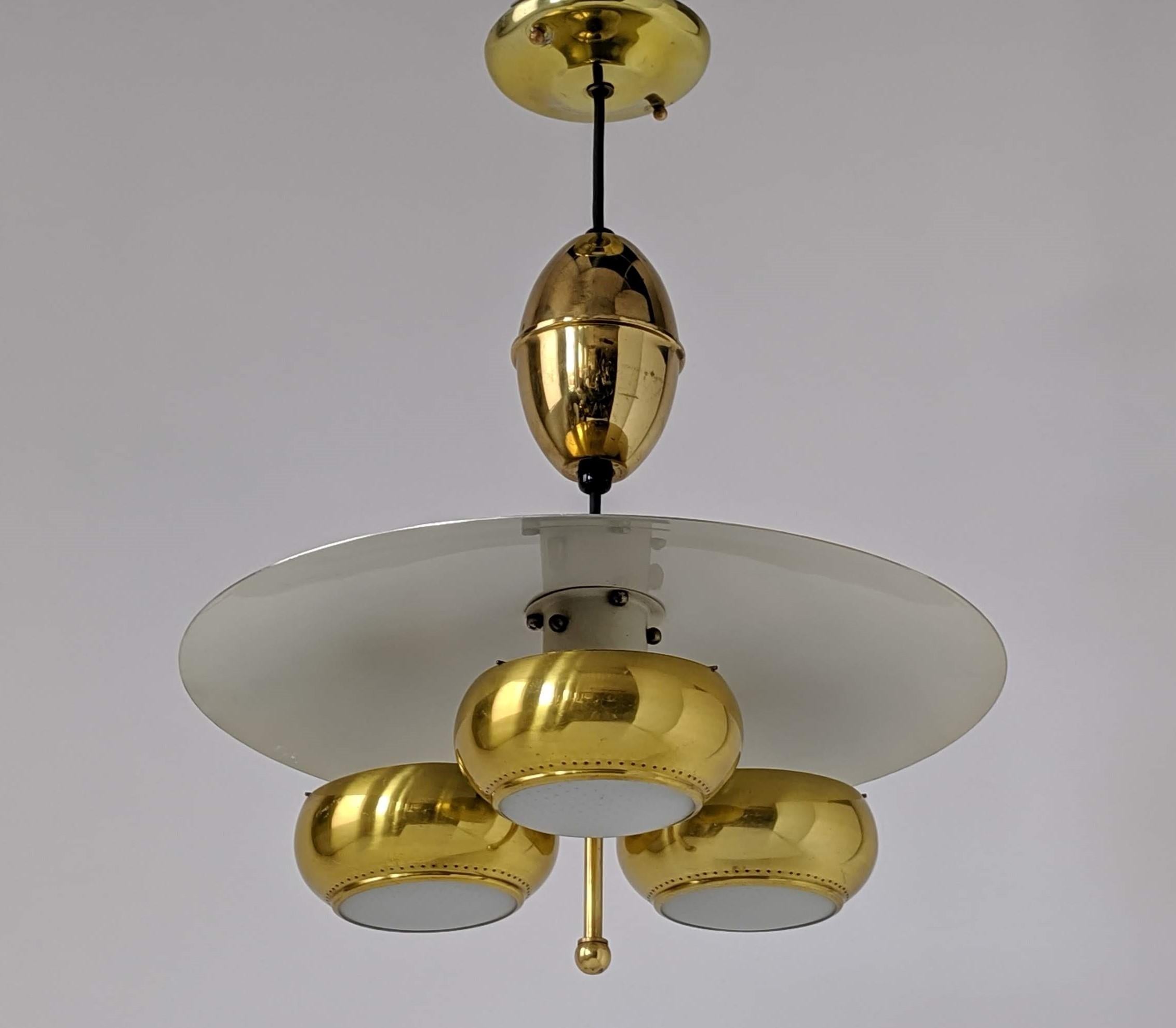 1950s brassglasswalnut chandelier by Moe 1950s brassglasswalnut chandelier by Moe