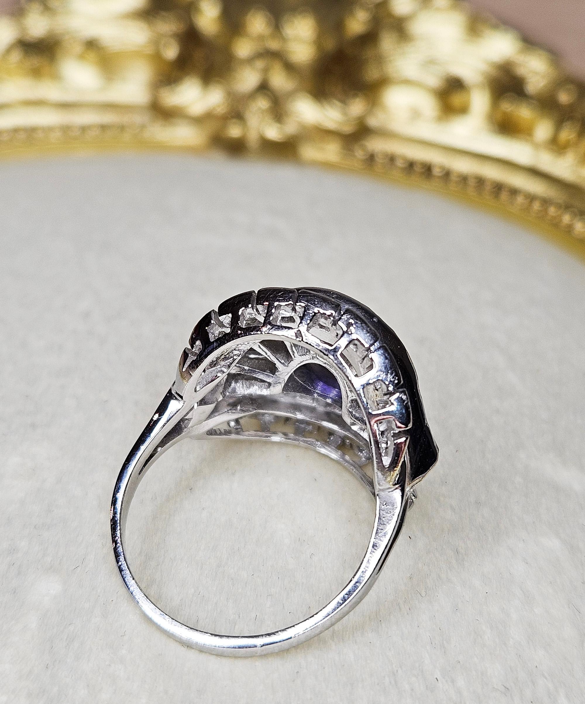 1950s GIA 4.38ctw Natural Color-Change PURPLE Unheated Round Sapphire Diamond Platinum Cocktail Cluster Vintage Ring.

Better than a ballerina ring, in this marvelous marriage of sublime color and sparkle, gleaming icy-white baguette, 2 fancy kites,