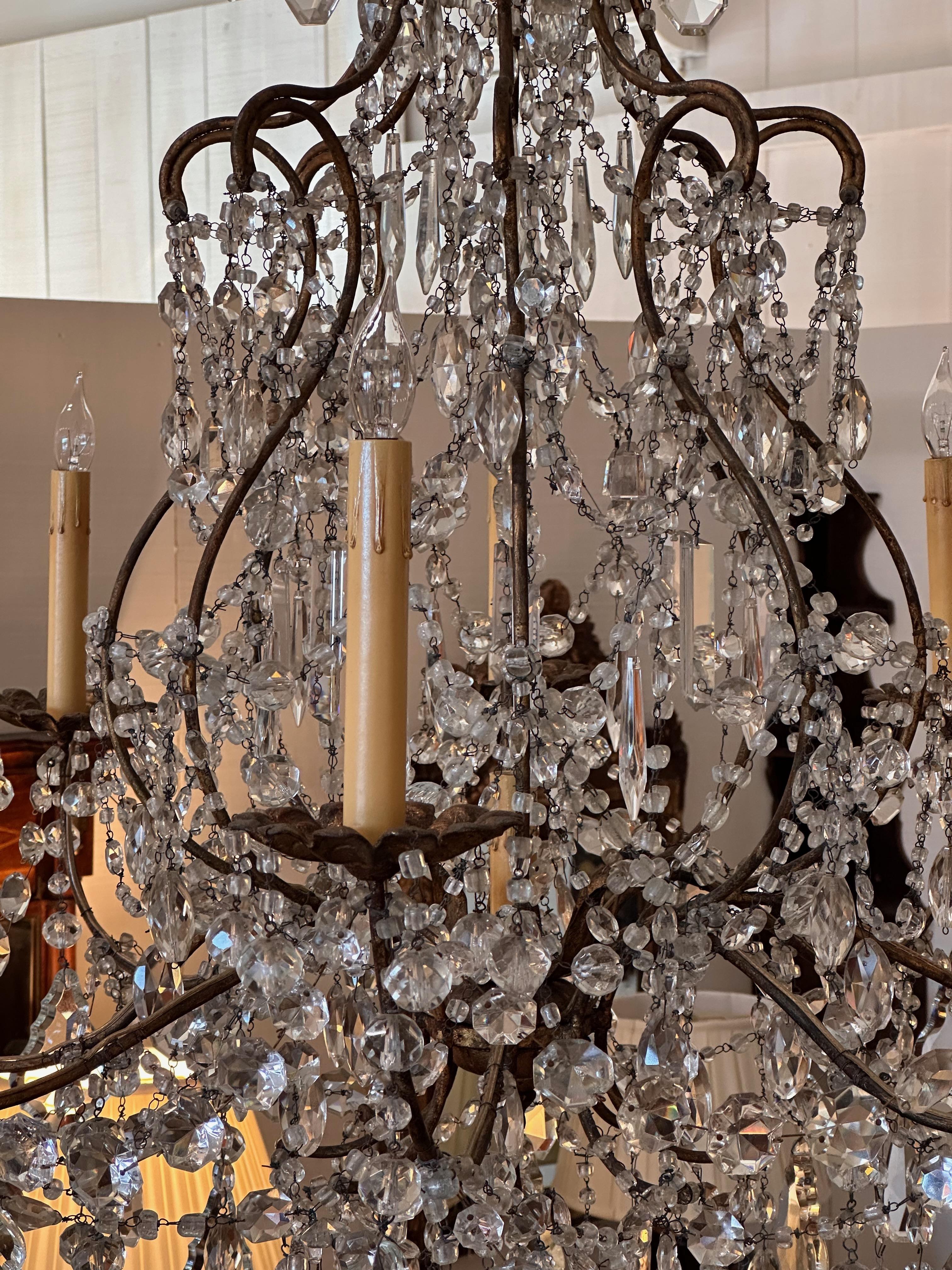 1950s Gilded Iron and Crystal Italian Chandelier In Good Condition For Sale In Charlottesville, VA
