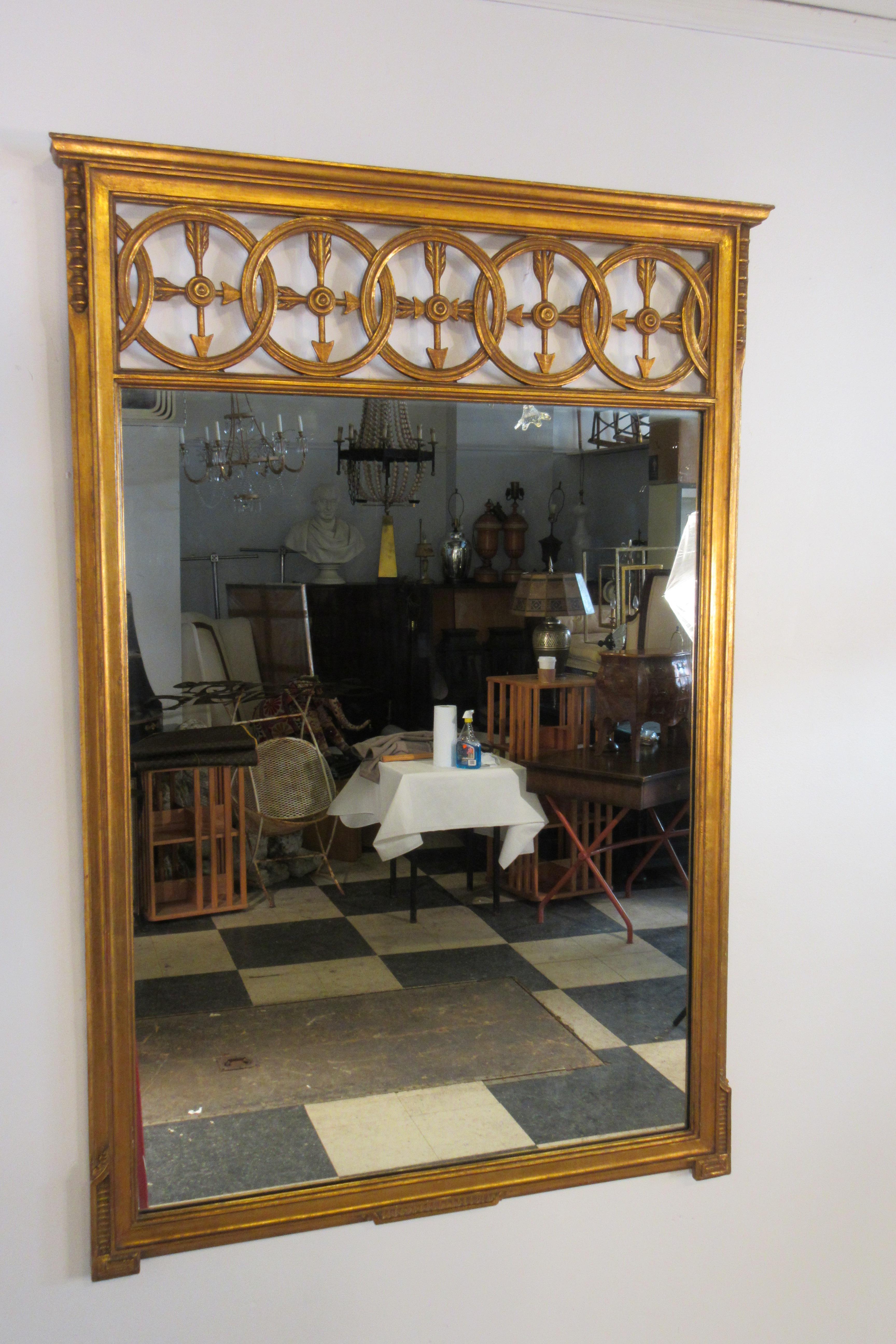 1950s gilt arrow mirror by Friedman Brothers.