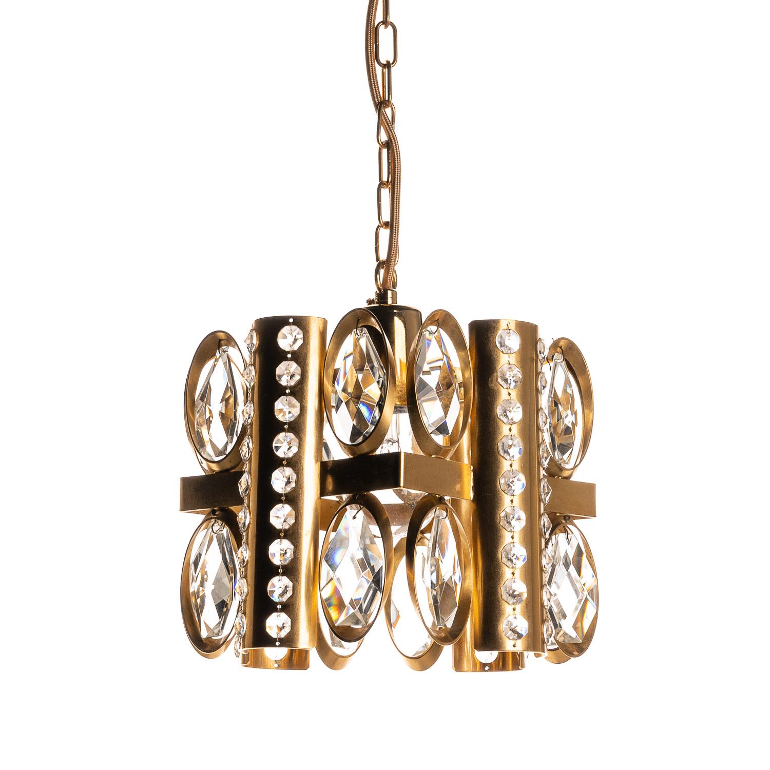 This is a stunning example of a Palwa 1950s chandelier. Newly wired and given fresh fittings, this pristine example adds a feeling of opulence and glamour to any space. This piece sparkles in its own presence and can be bought as a single unit or a