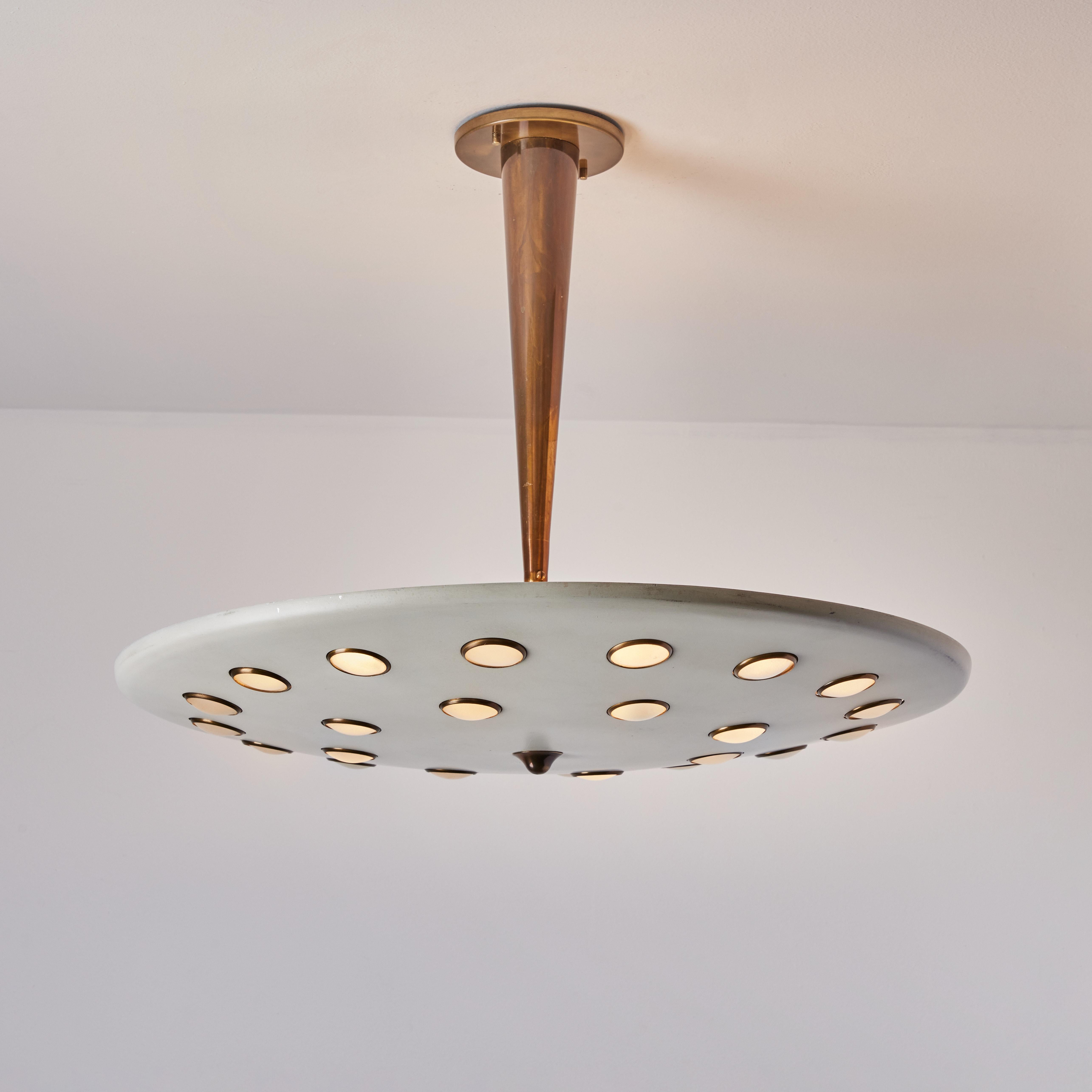 1950s Gino Sarfatti metal & glass circular ceiling lamp for Arteluce. An extremely attractively scaled ceiling lamp of incomparably refined design comprised of a large painted metal disc with circular cut outs holding brass framed thick glass