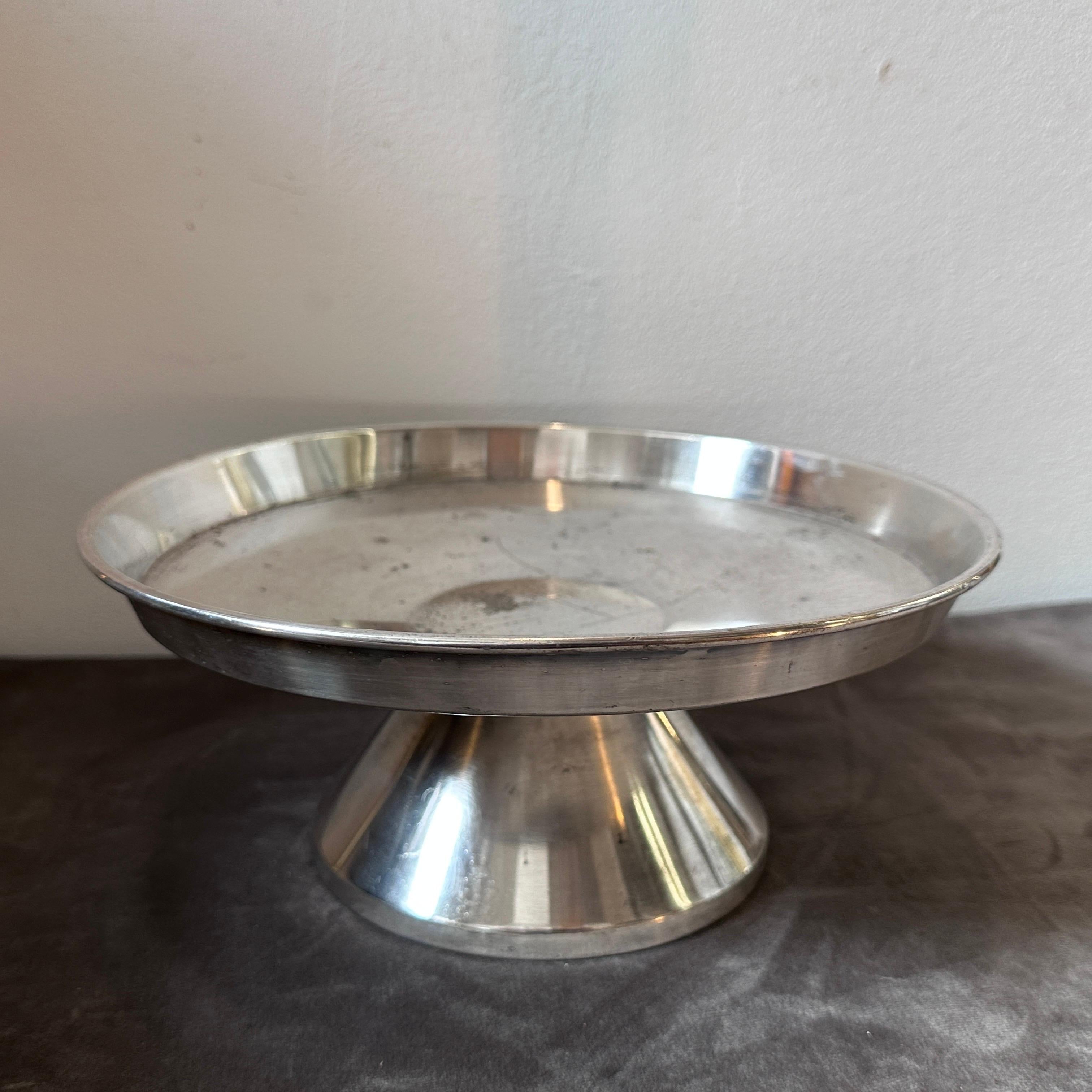 An alpaca centerpiece designed by Gio Ponti for Krupp Milano, it was used for hotellerie, it's in original conditions. It'is a remarkable and collectible piece of functional art. Gio Ponti was a prominent figure in Mid-Century Modern design, known
