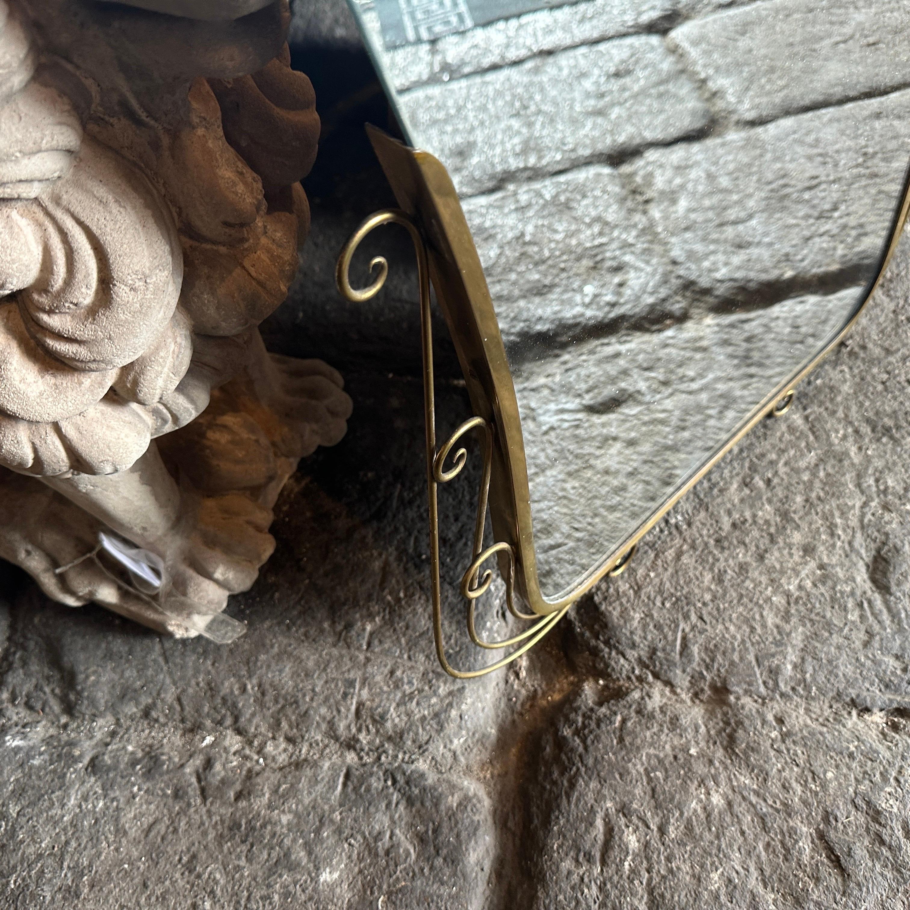 Italian 1950s Gio Ponti Style Mid-Century Modern Brass and Glass Wall Mirror For Sale