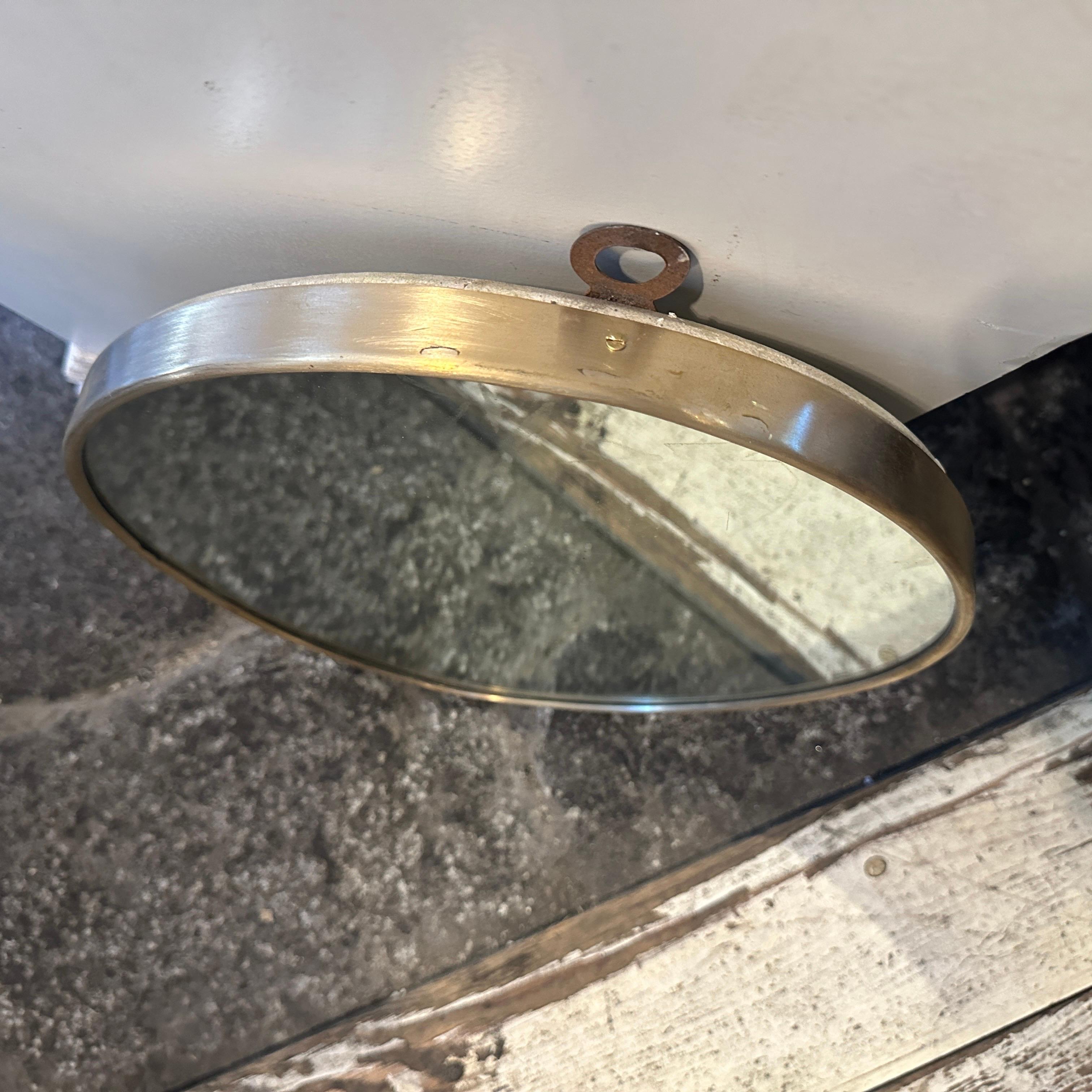 Hand-Crafted 1950s Giò Ponti Style Mid-Century Modern Brass Italian Oval Wall Mirror For Sale